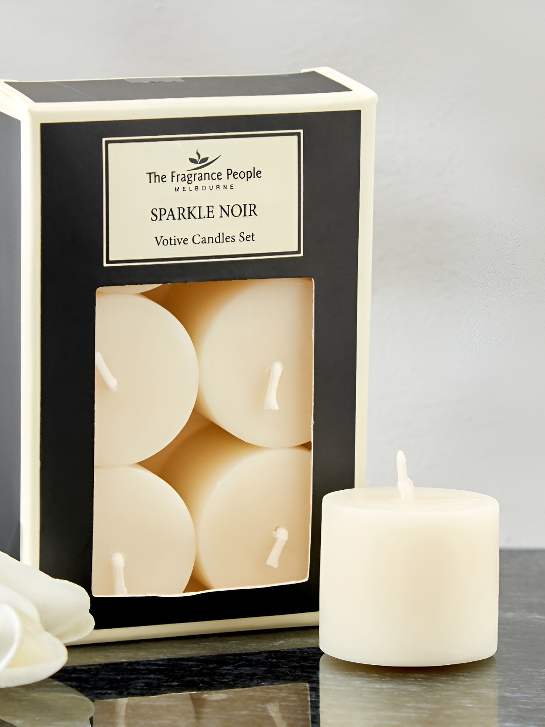 

Home Centre boutique White and Black 6 Pieces Sparkle Noir Scented Pillar Votive Candle