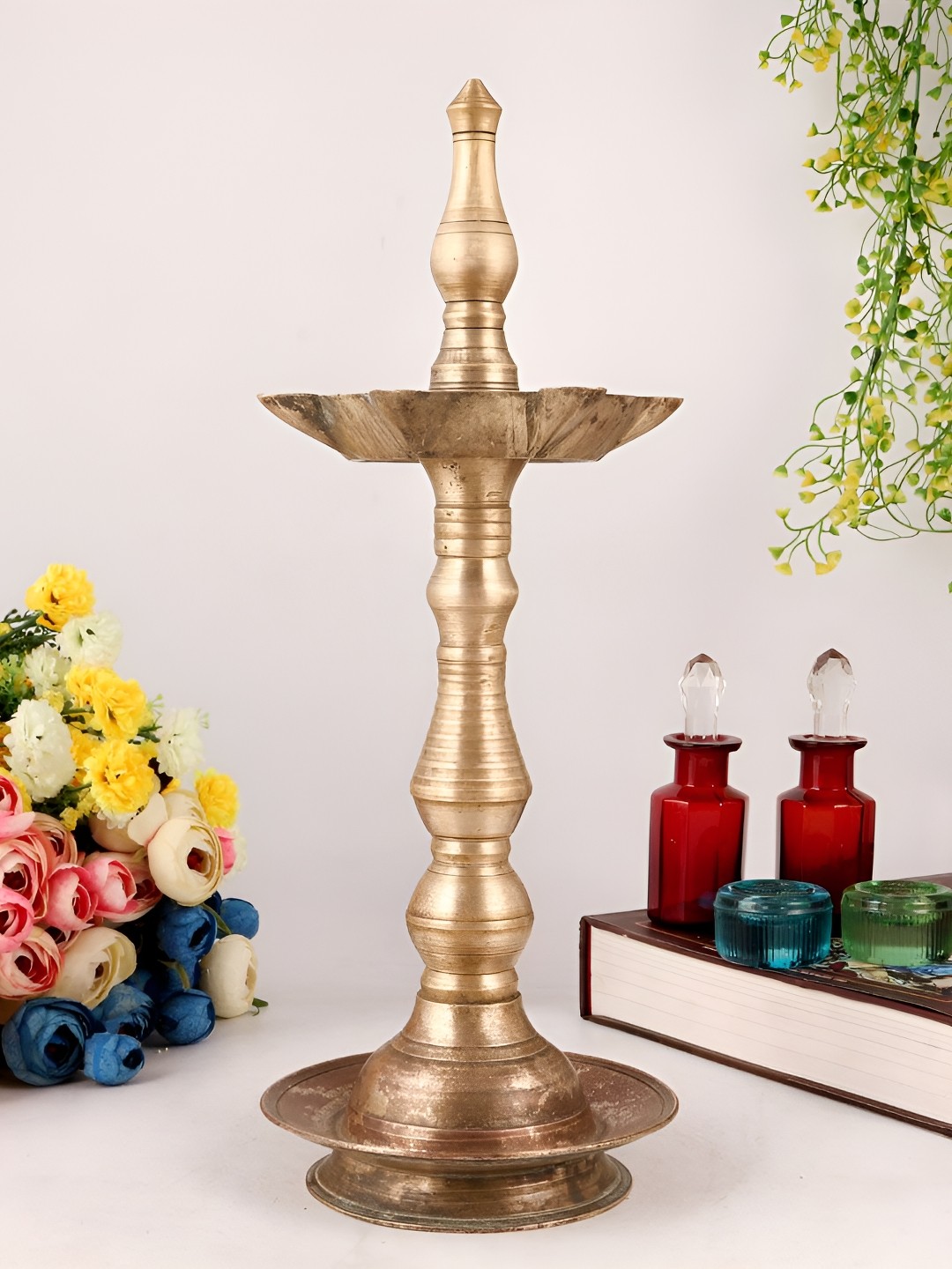 

Indianshelf Gold-Toned Textured Brass Diwali Standing oil Lamp Diya