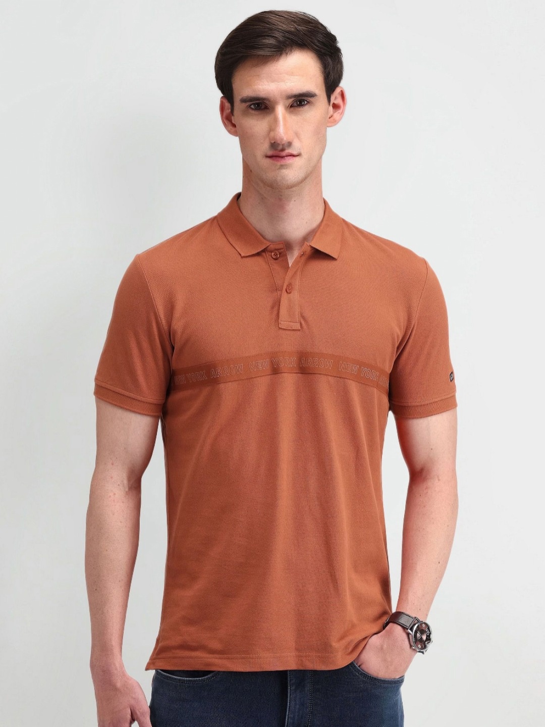 

Arrow Sport Men Typography Printed Polo Collar Cotton T-shirt, Rust