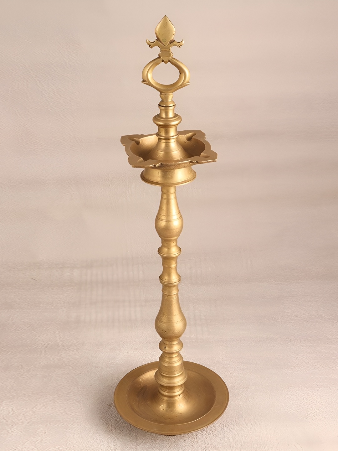 

Indianshelf GoldToned Textured Brass Diwali Standing Diya, Gold