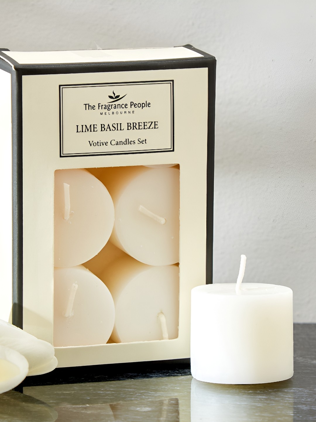 

Home Centre Boutique White 6 Pieces Lime Basil Breeze Scented Votive Candles