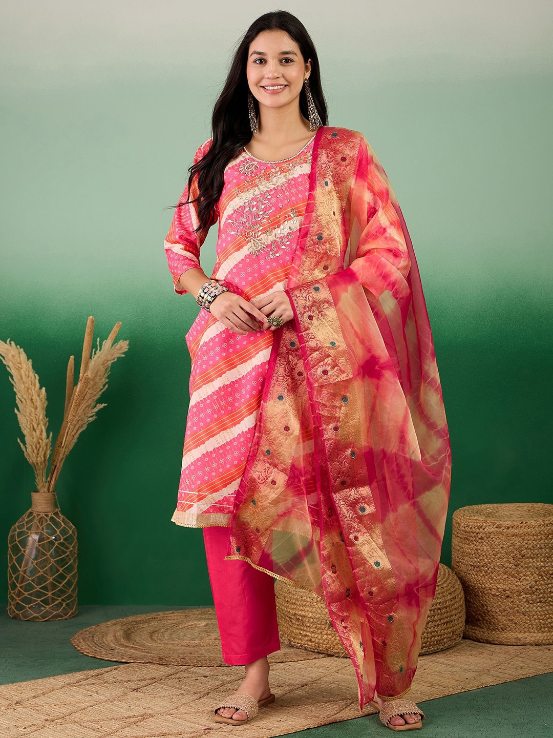 

Maroosh Women Leheriya Printed Embellished Kurta & Trouser with Dupatta, Peach