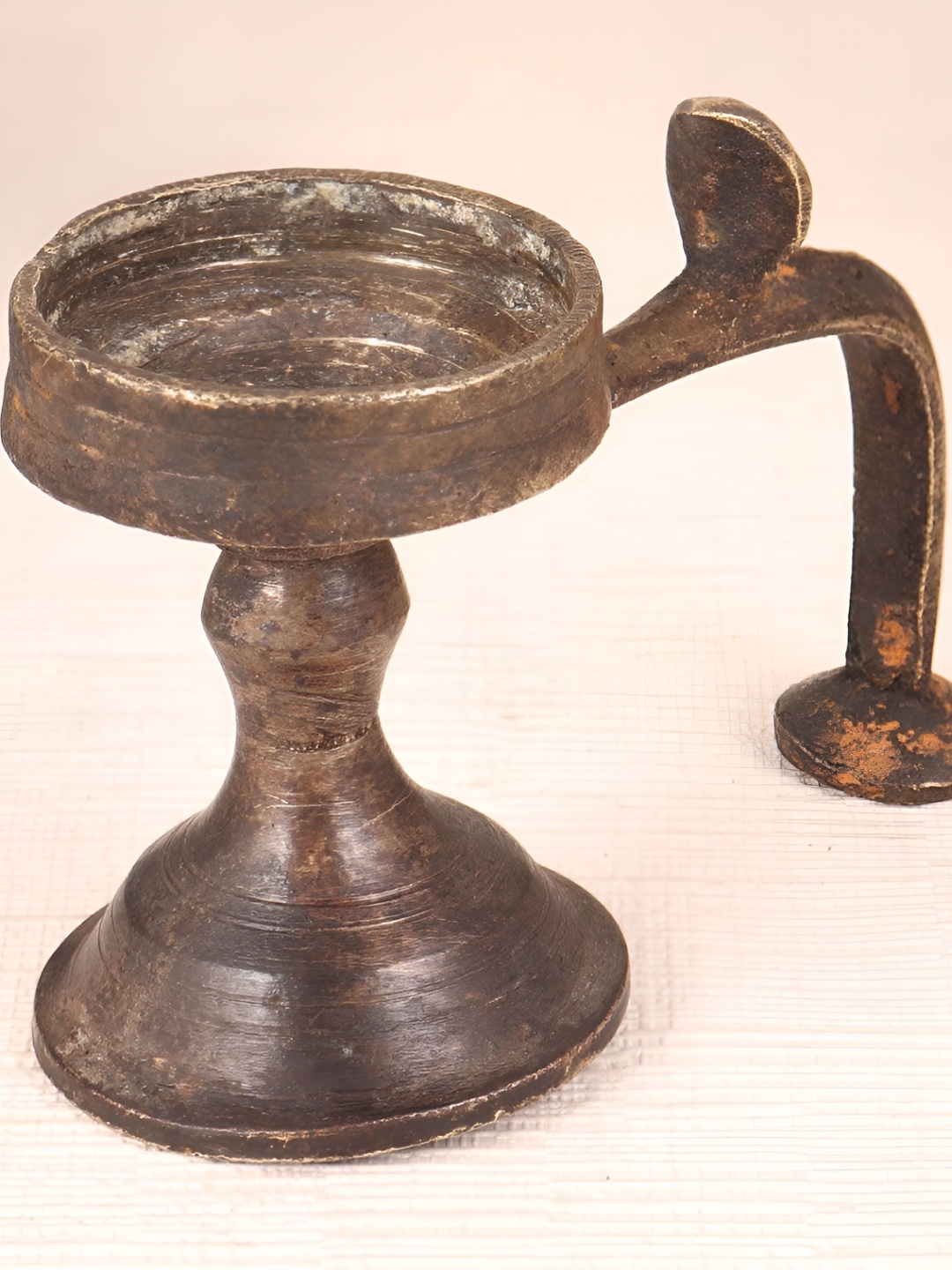 

Indianshelf Bronze Toned Textured Brass Pooja Diya