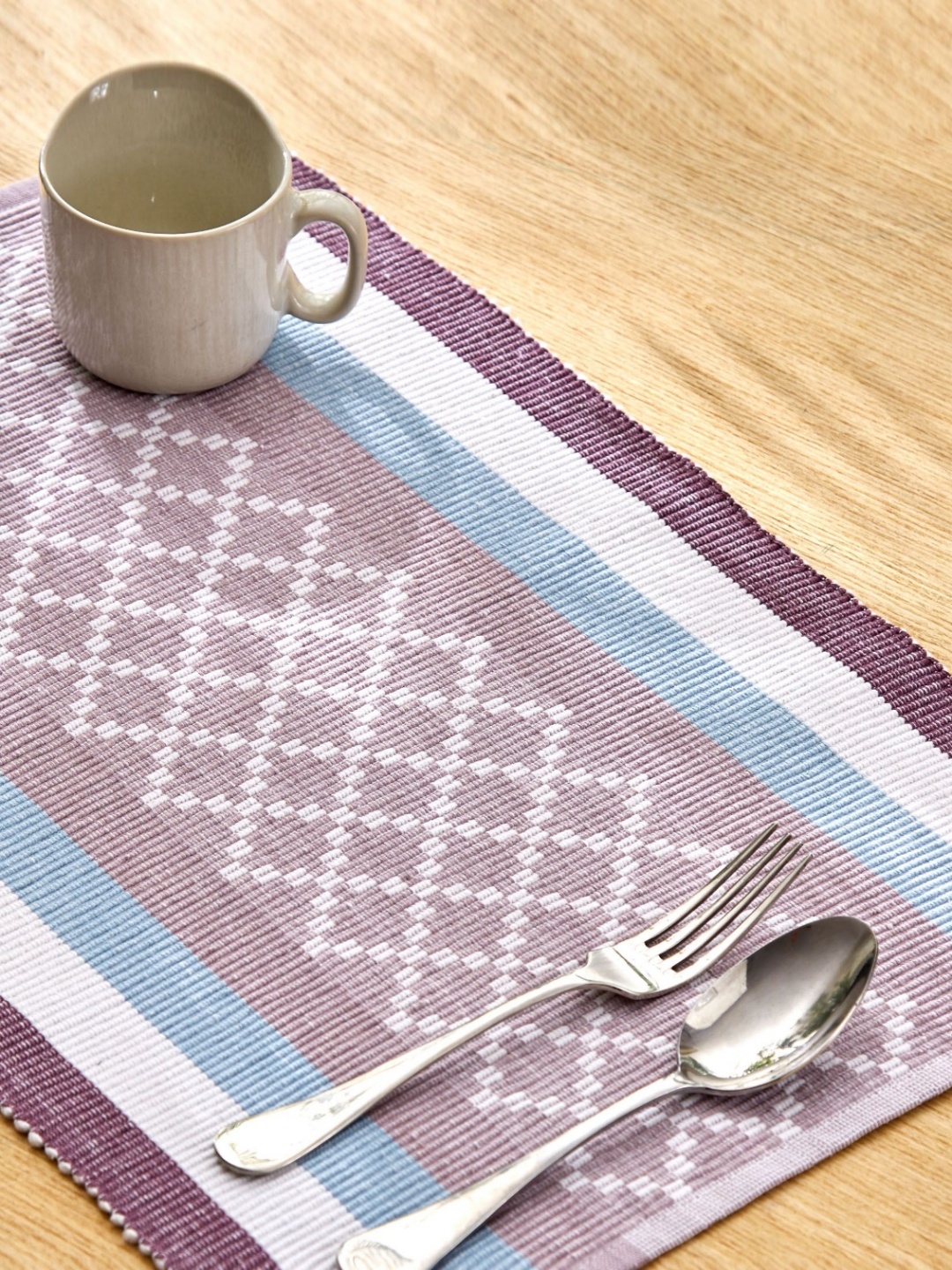 

Home Centre Drake Crane Maroon & Blue Ribbed Table Placemat