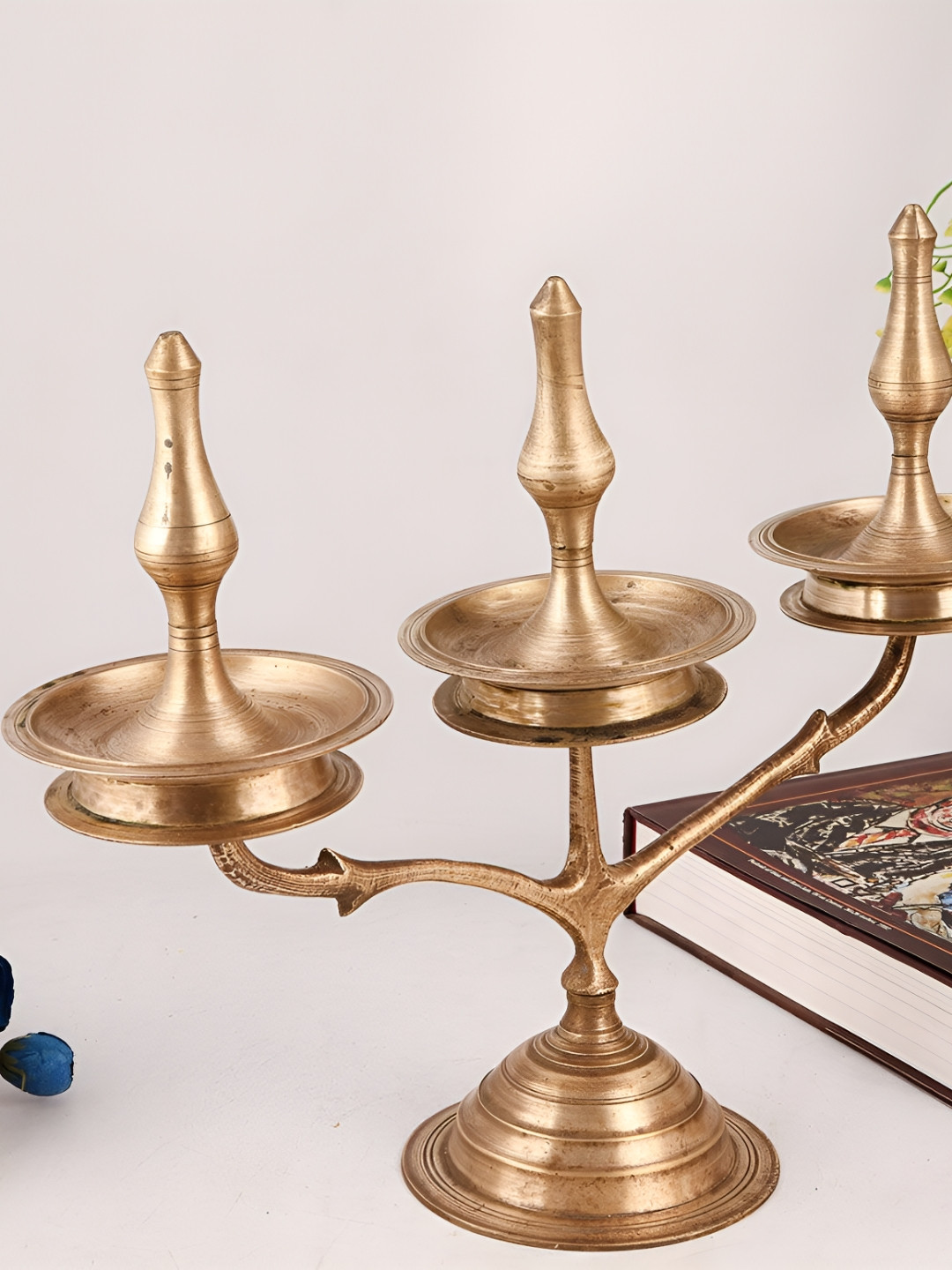 

Indianshelf Gold Toned Textured 3 Branch Brass Diwali Diya