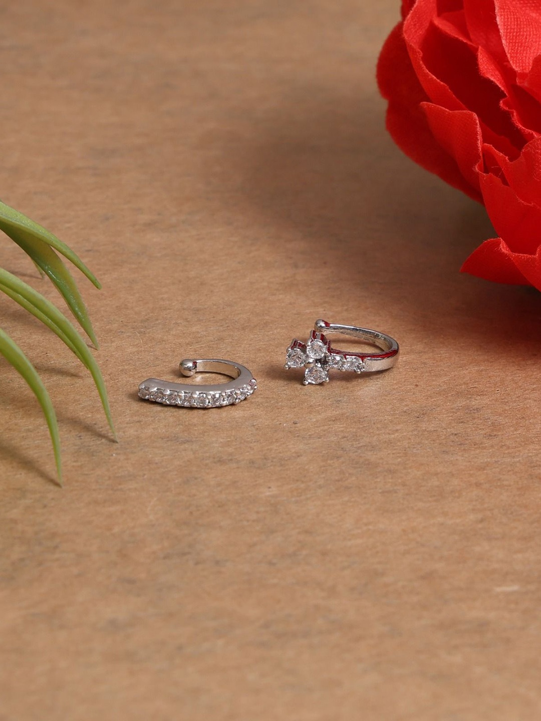 

Mali Fionna Set Of 2 Silver Plated American Diamond Studded Ring Nosepins