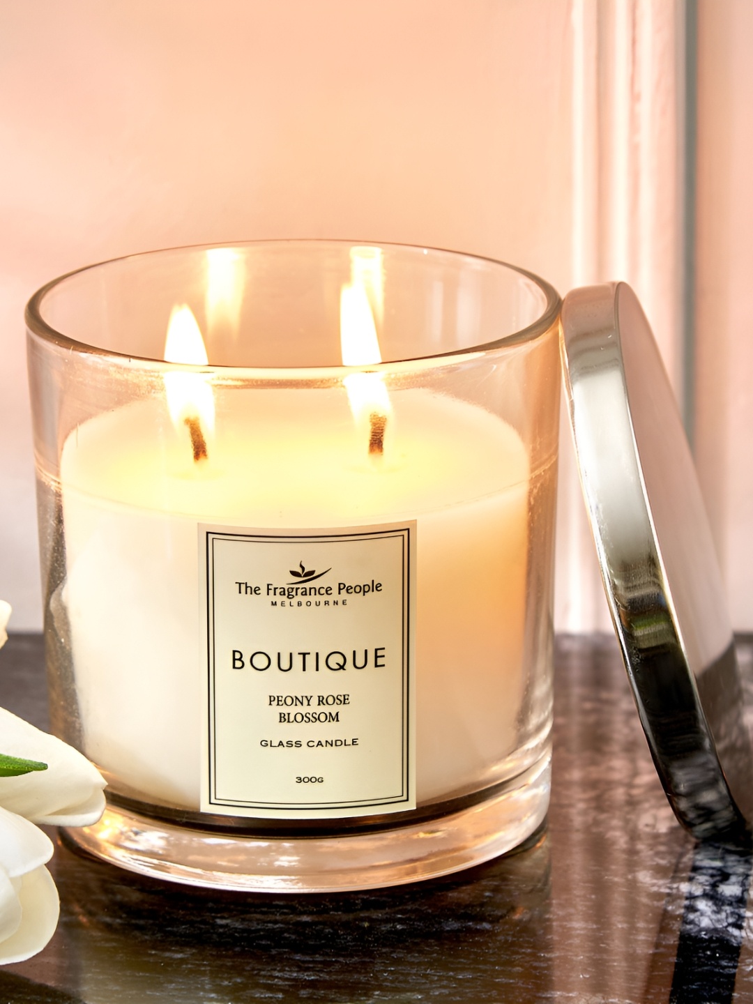 

Home Centre Boutique White and Transparent Peony Rose Blossom Scented Jar Candle