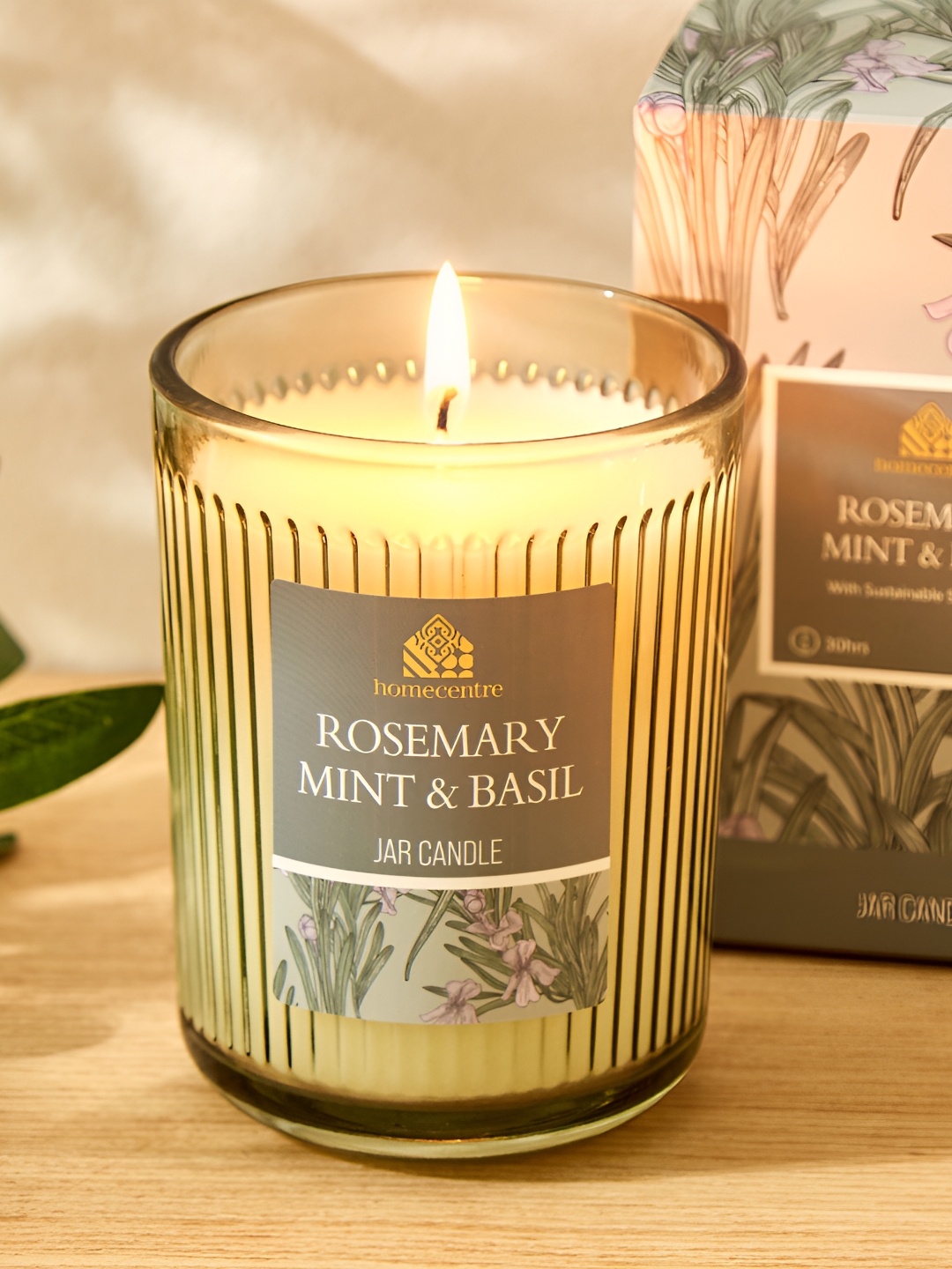 

Home Centre Utopia Green and Grey Rosemary Mint and Basil Scented Jar Candle
