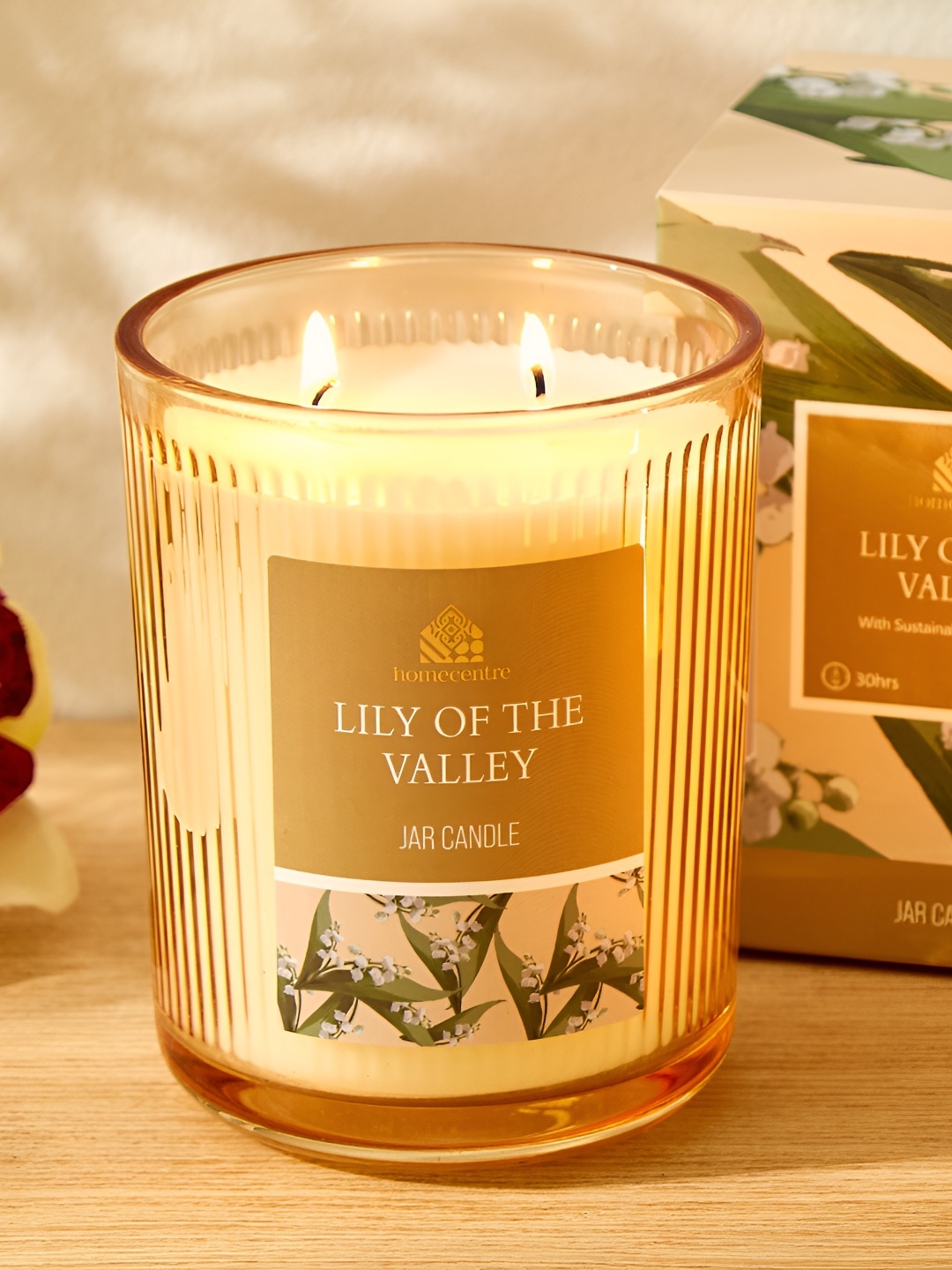 

Home Centre Utopia Beige and White Lily Of The Valley Scented Jar Candle