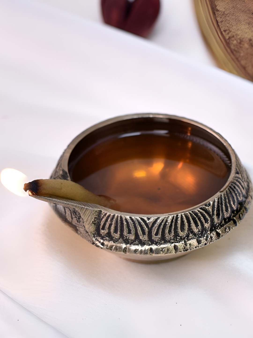 

Indianshelf Gold-Toned Textured Brass Diya Pooja Essentials
