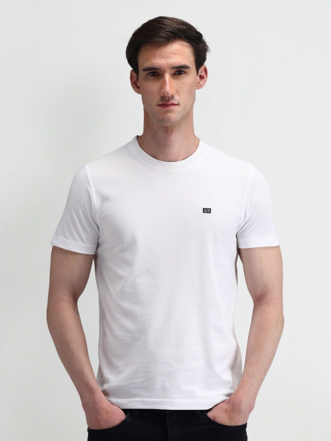 

Arrow Sport Men Solid Round Neck Cotton Slim Fit T-shirt, White