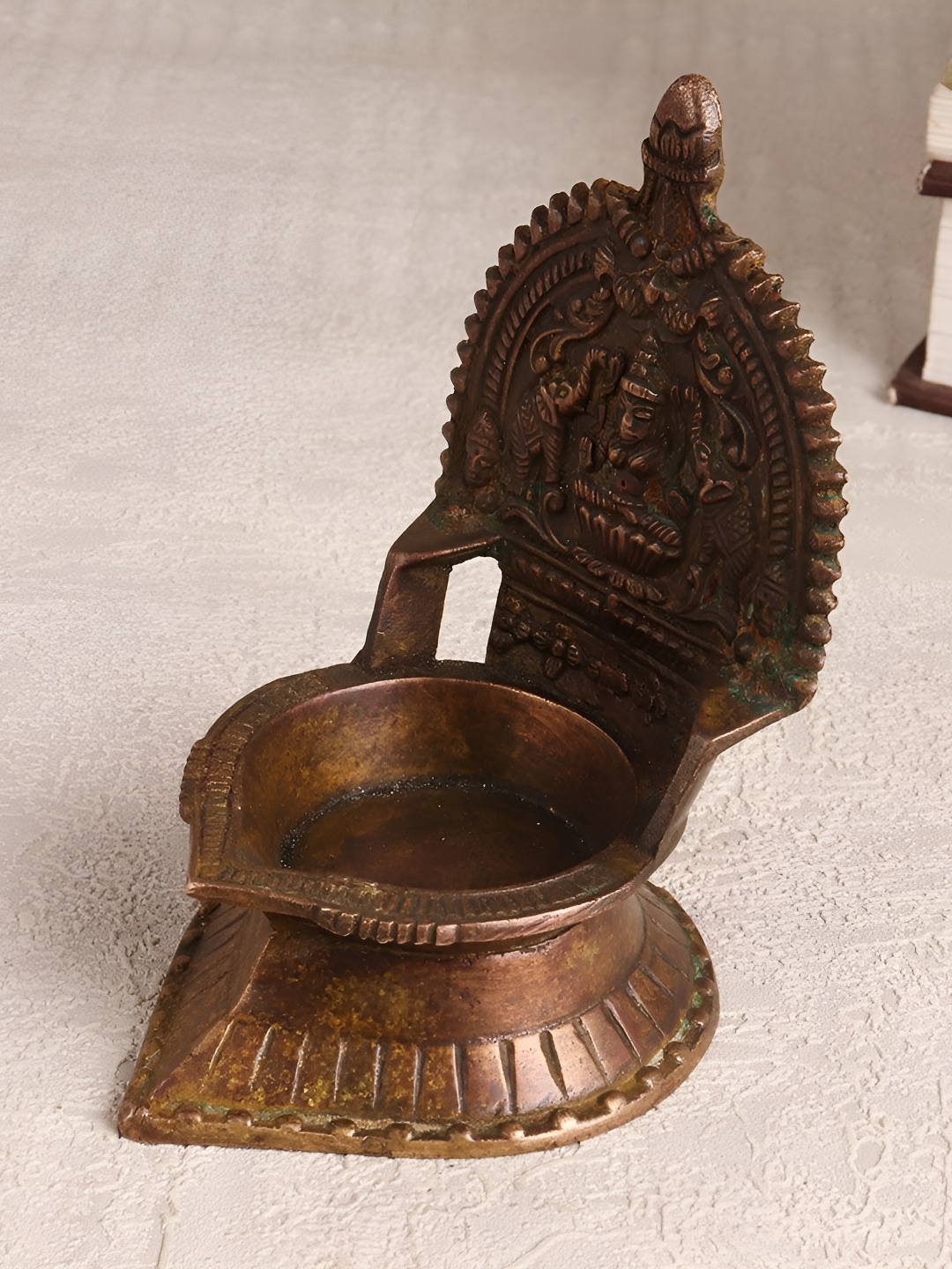 

Indianshelf Bronze Toned Textured Brass Pooja Diya