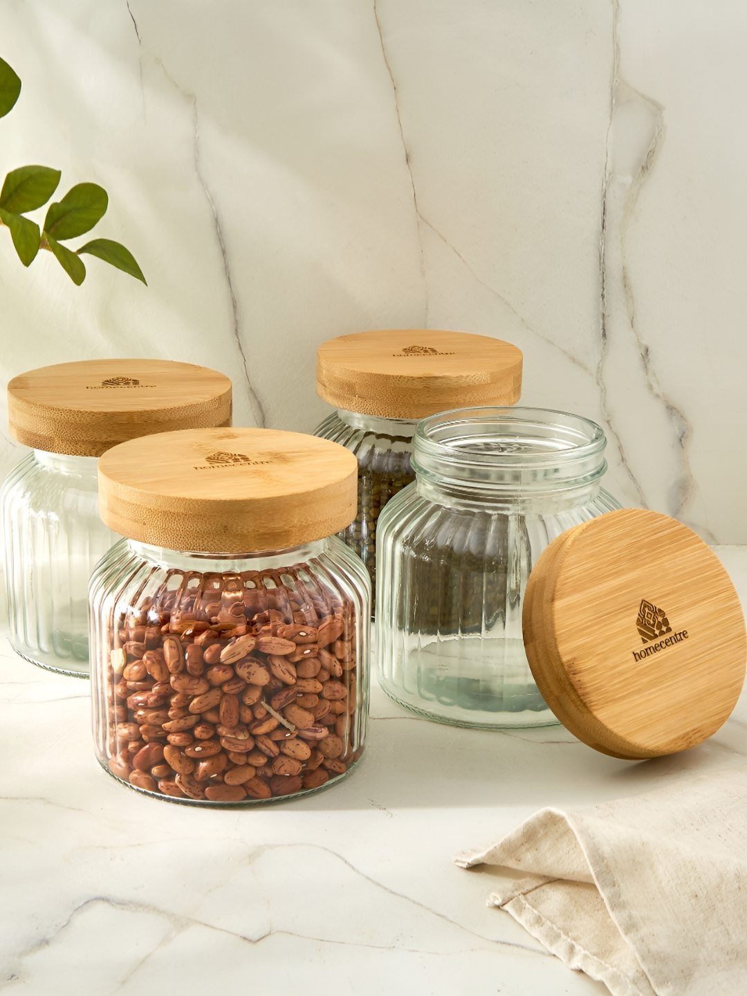 

Home Centre Vamos Prague Grey Transparent 4 Pieces Glass Canister Container-700ML