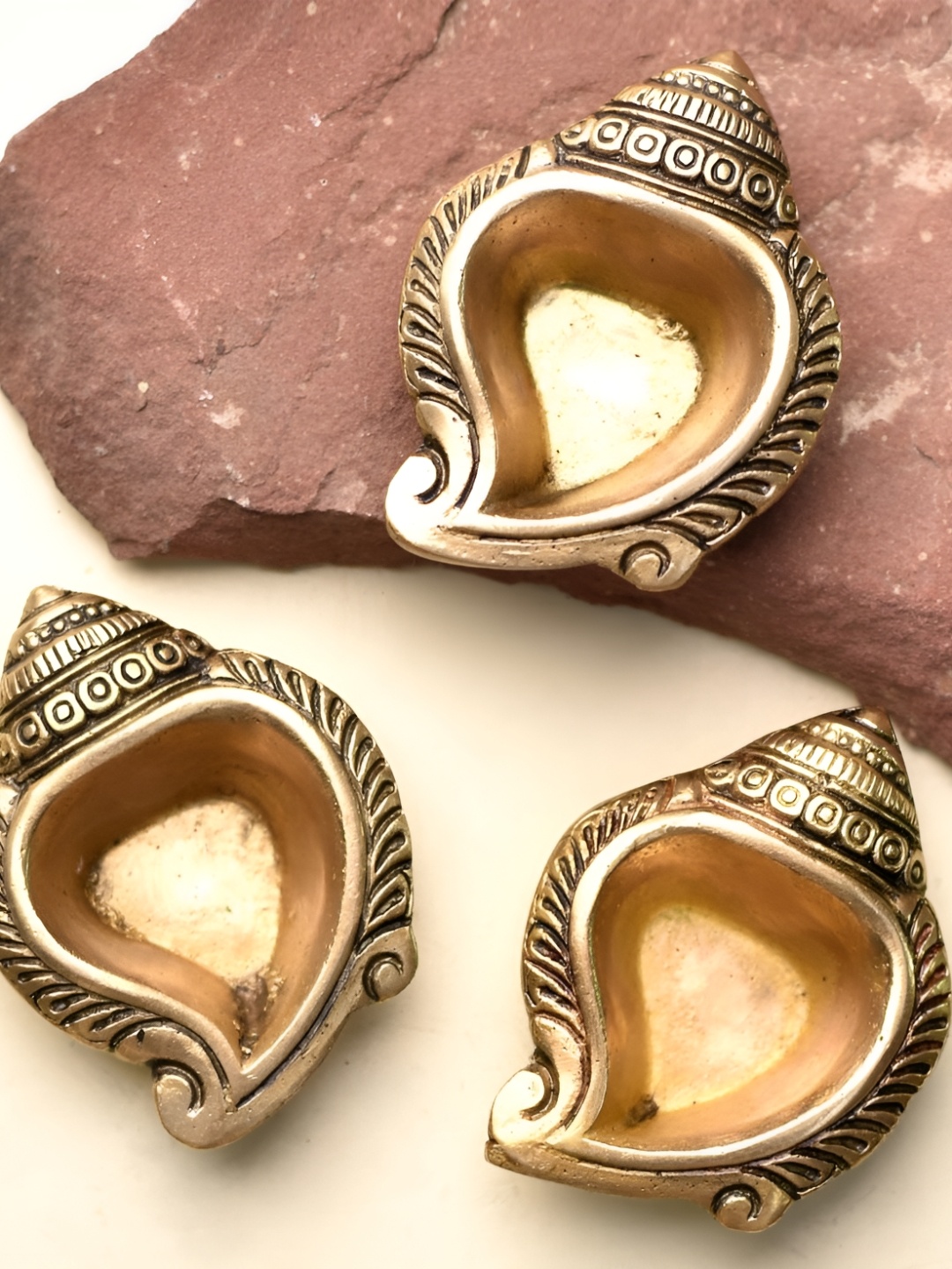 

Indianshelf Gold Toned 3 Pieces Textured Brass Pooja Diyas