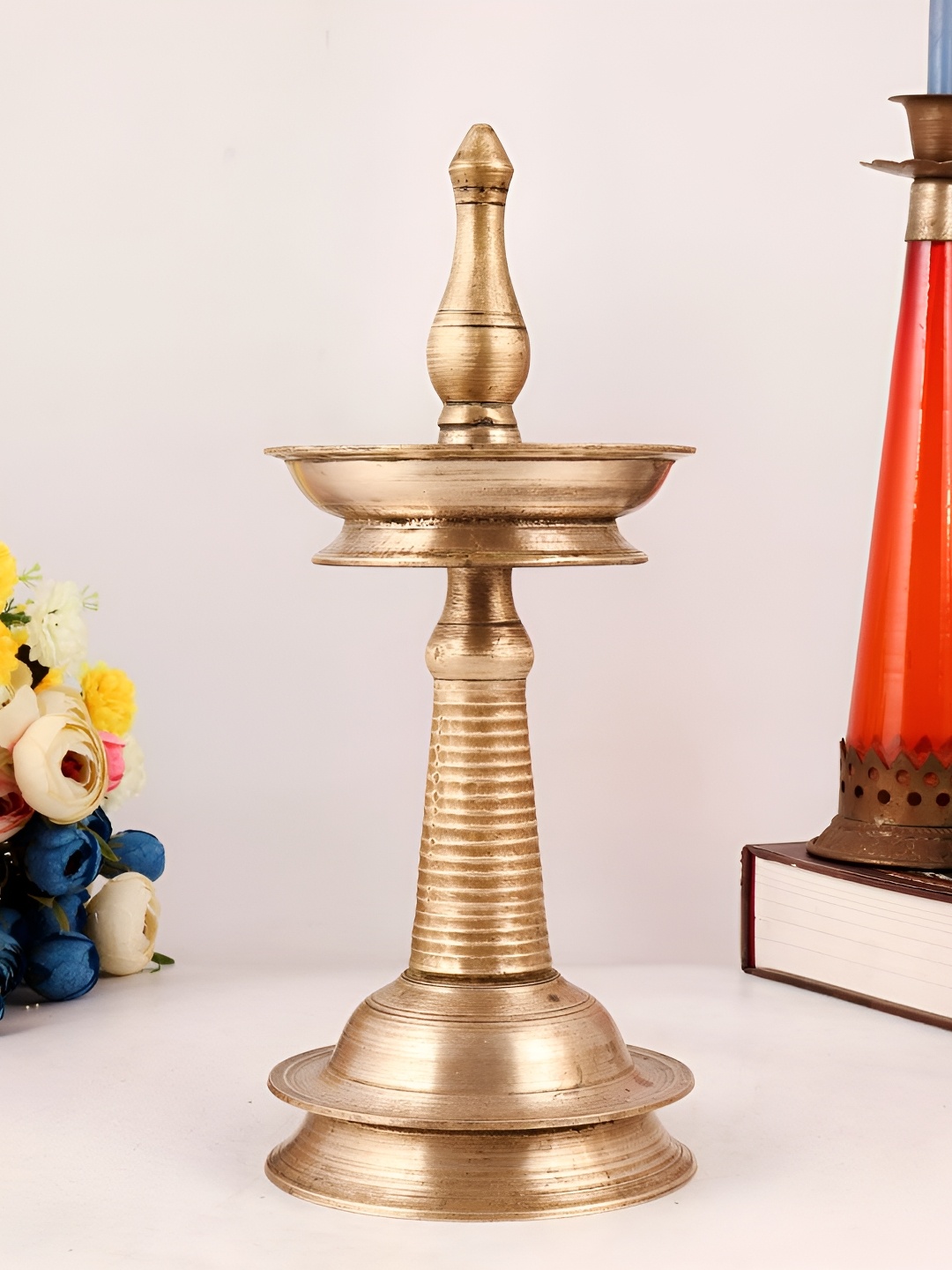 

Indianshelf Gold Toned Textured Brass Diya
