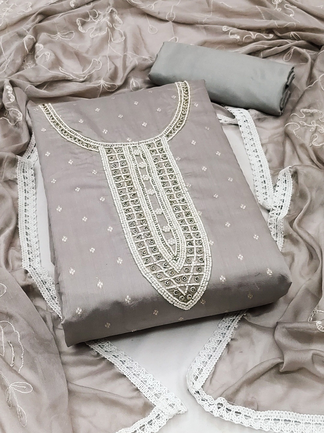 

Ishin Grey & White Embroidered Unstitched Dress Material