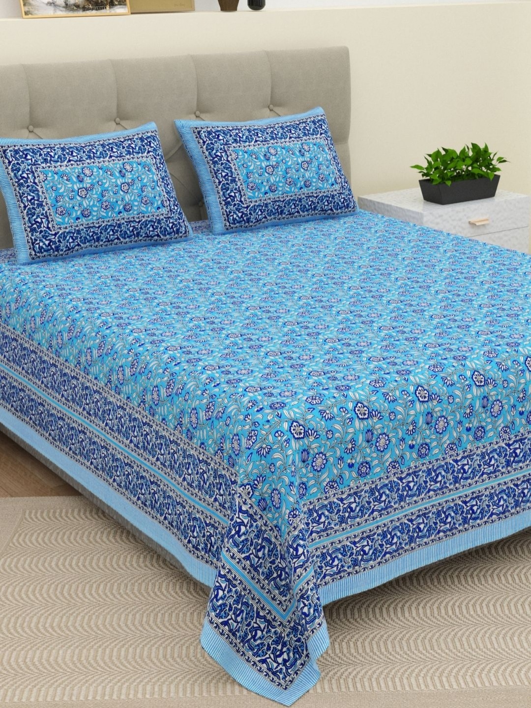 

The Craft Monk Blue & White Floral Printed 210 TC Cotton King Bedsheet with 2 Pillow Cover