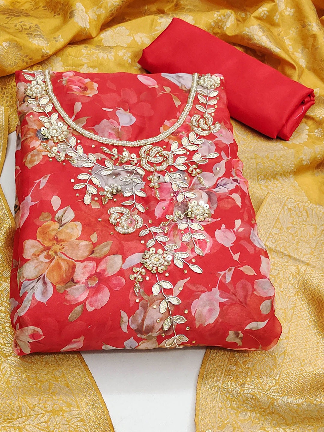 

Ishin Red Floral Embroidered Beads and Stones Organza Unstitched Dress Material