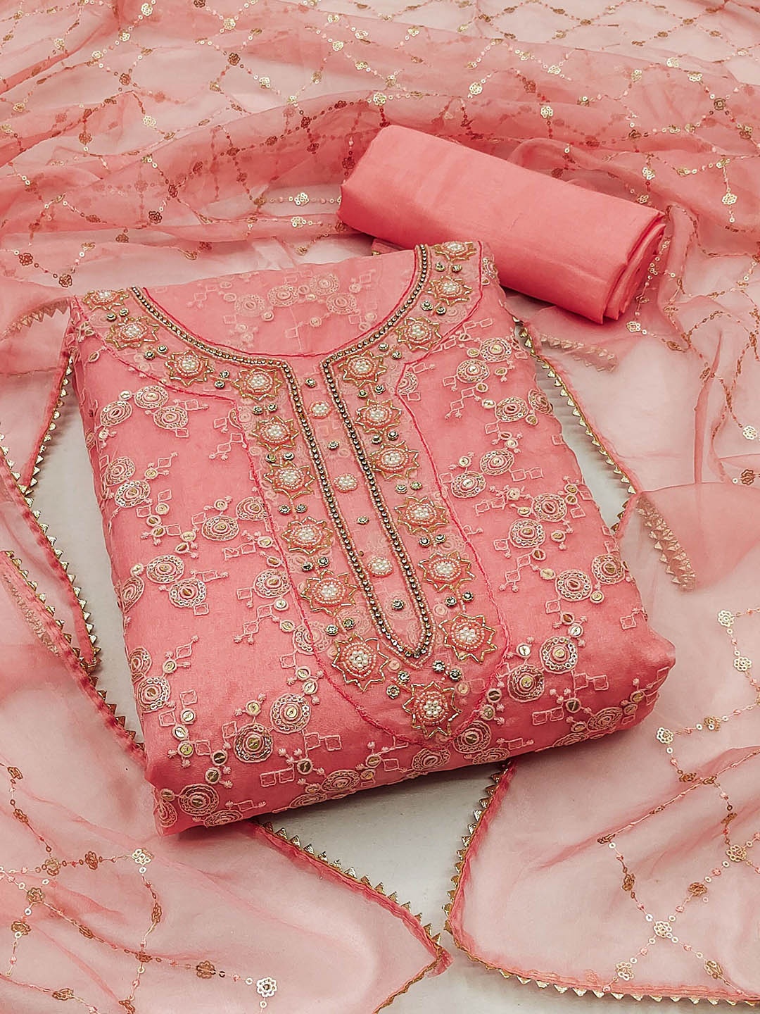 

Ishin Peach-Coloured Embroidered Organza Unstitched Dress Material