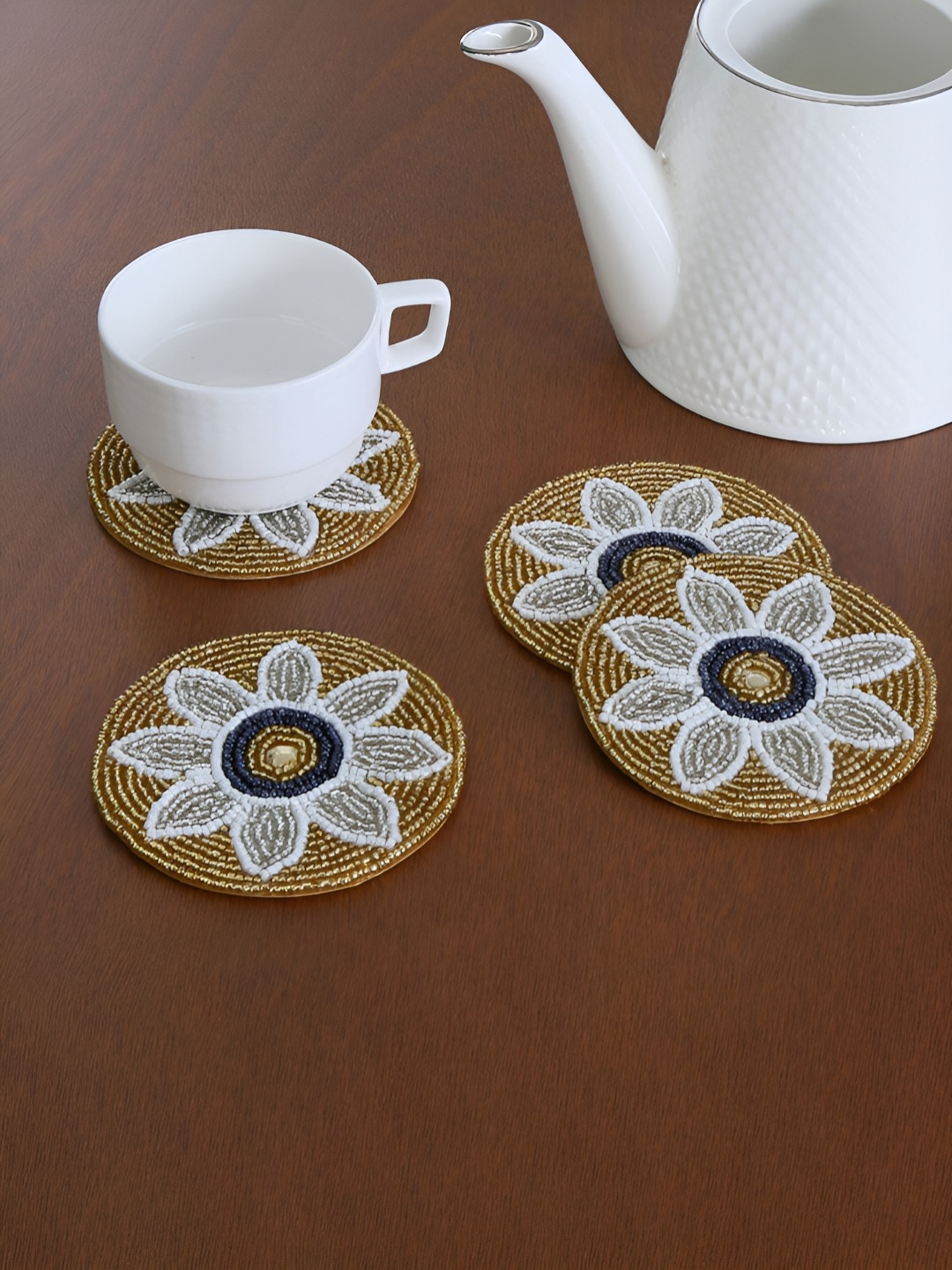 

Athome by Nilkamal Brown & Grey 4 Pieces Floral Embellished Round Shaped Beaded Coasters