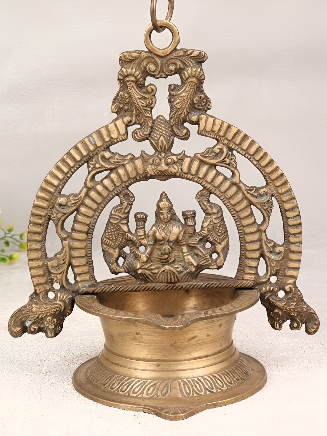 

Indianshelf Gold Toned Brass Textured Brass Pooja Diya