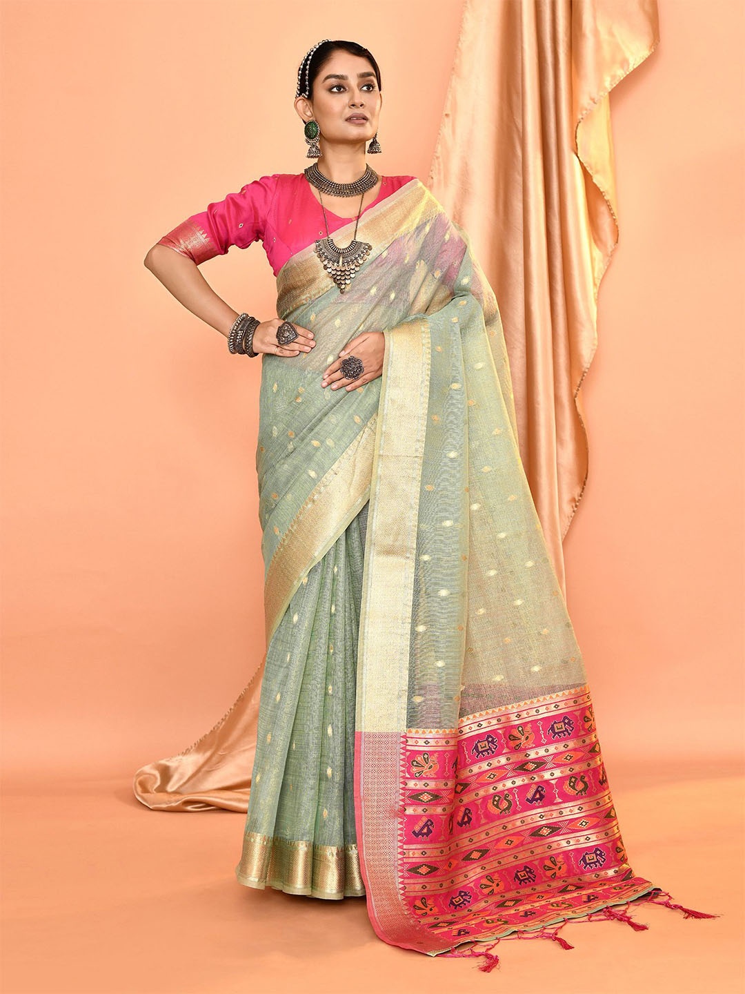 

elora Woven Design Zari Pure Linen Ikat Saree, Green
