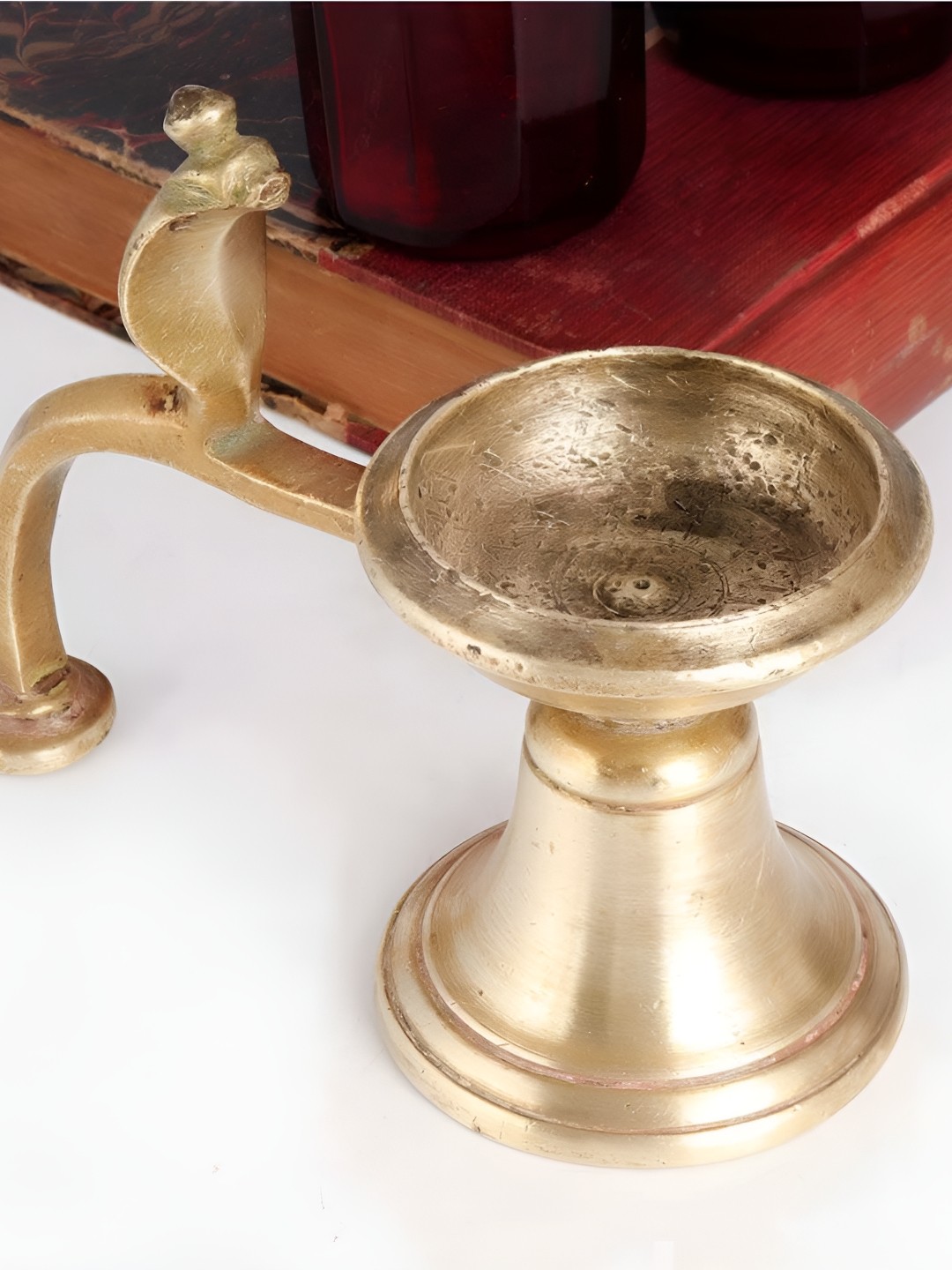 

Indianshelf Gold Toned Brass Textured Pooja Aarti Diya