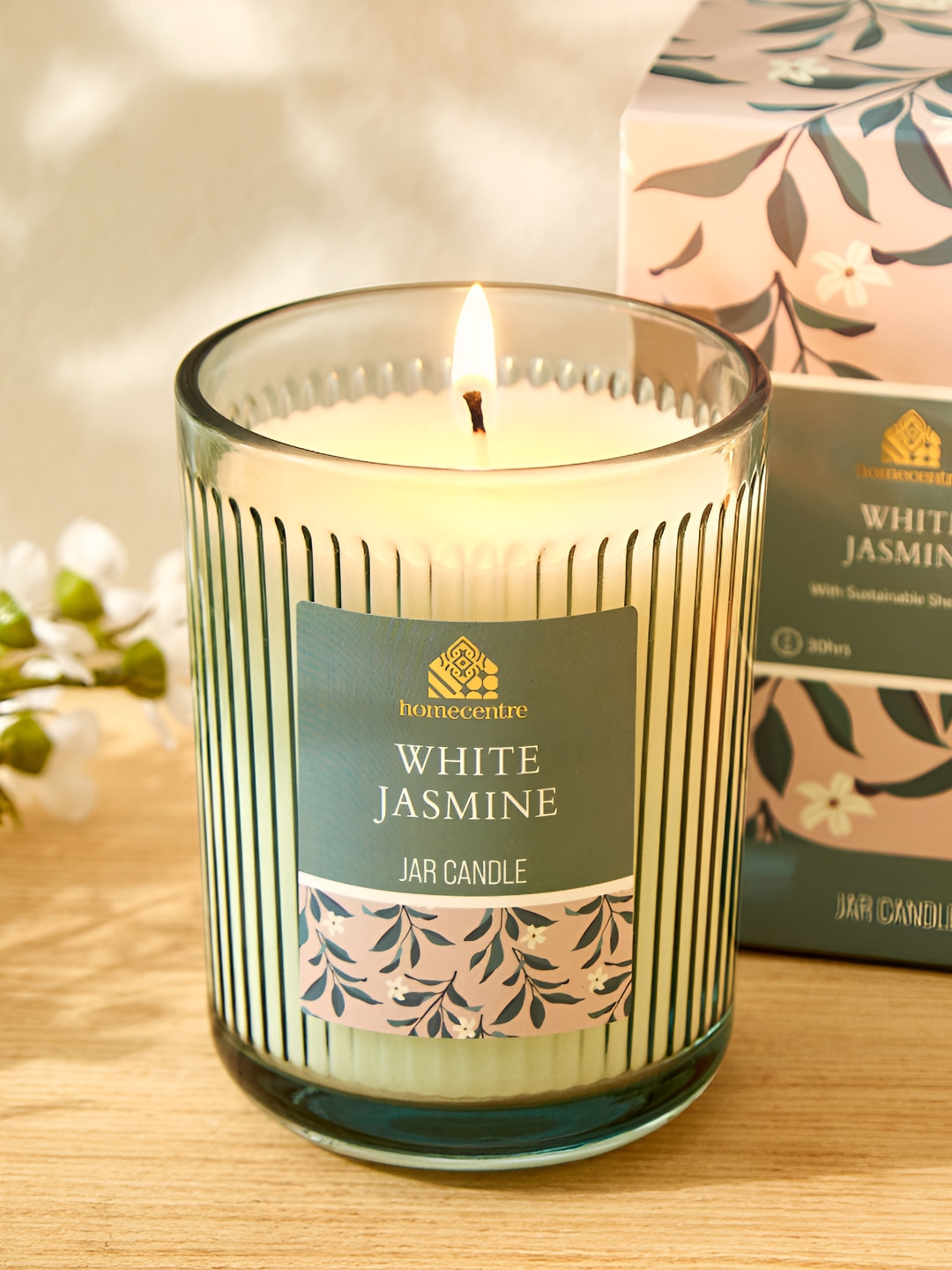 

Home Centre Utopia Green and White Jasmine Scented Jar Candle
