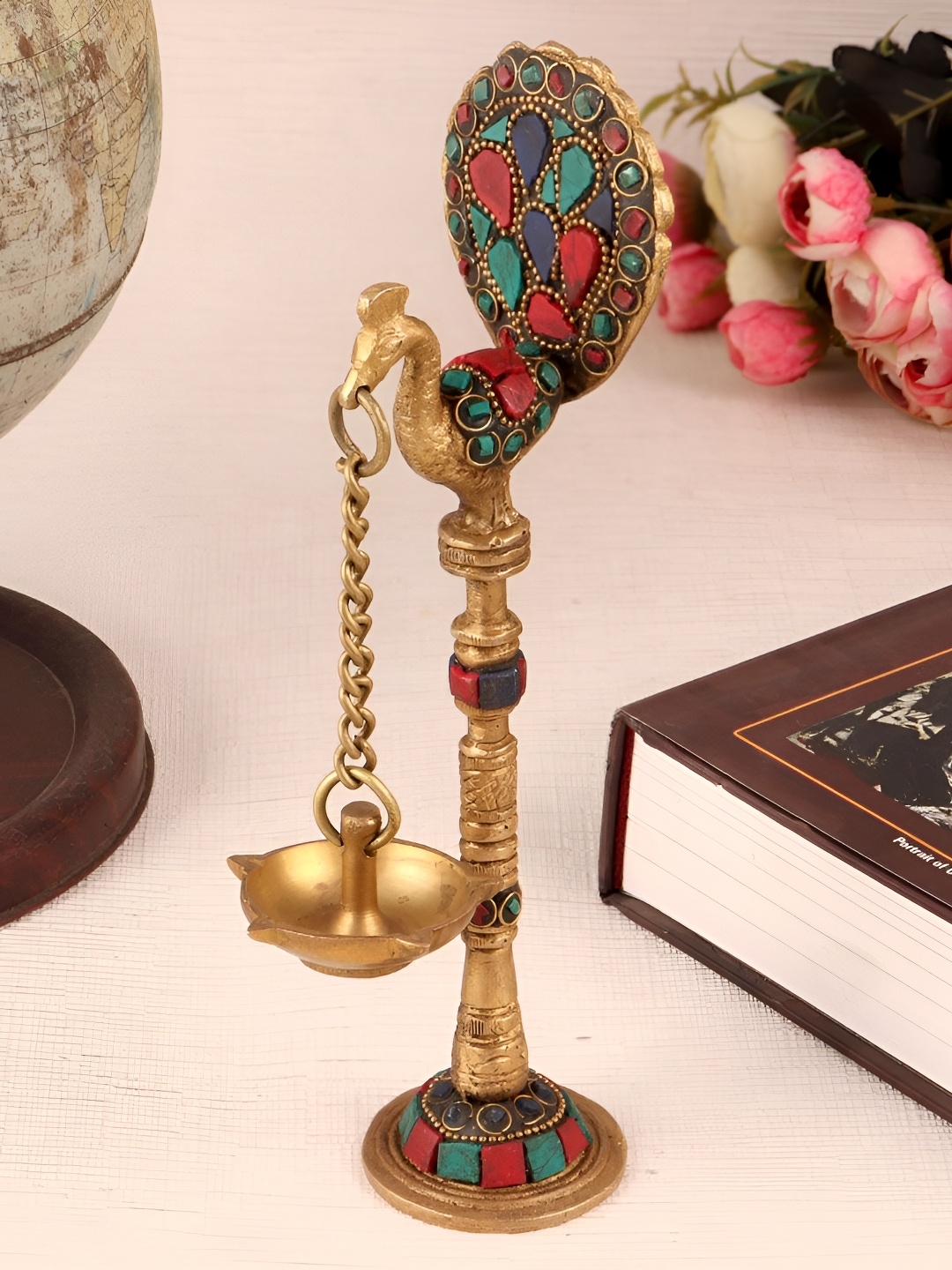 

Indianshelf Gold-Toned & Red Textured Brass Diwali Peacock Deepam Diya