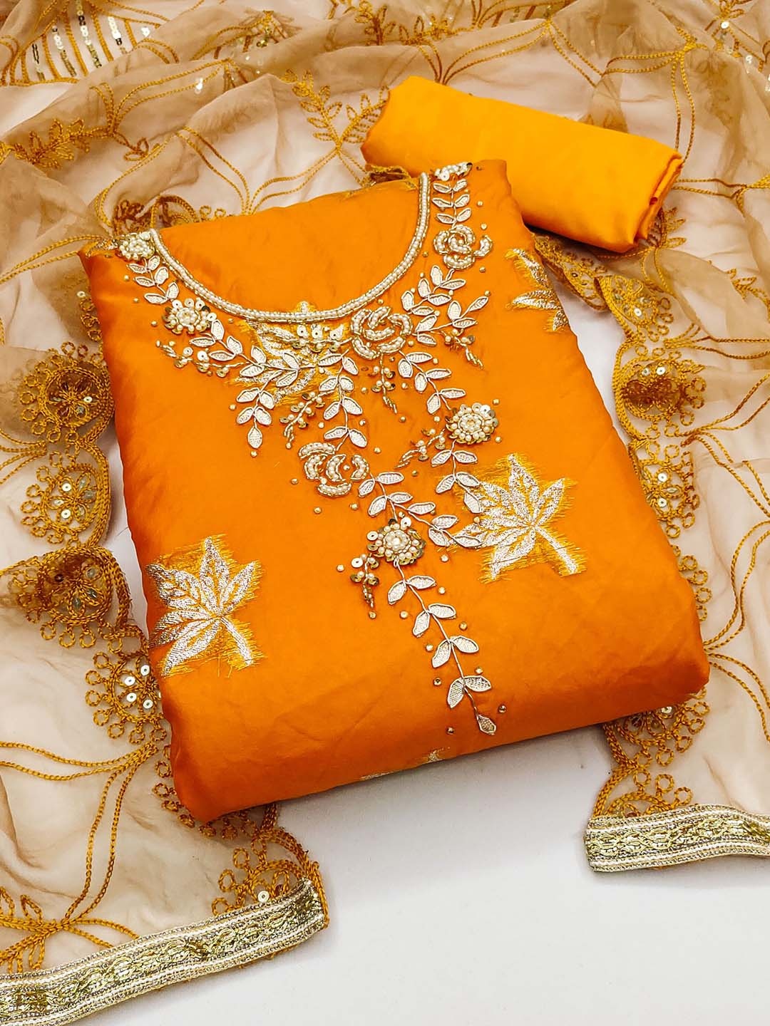 

Ishin Orange-Coloured Ethnic Motifs Embroidered Beads and Stones Ustitched Dress Material