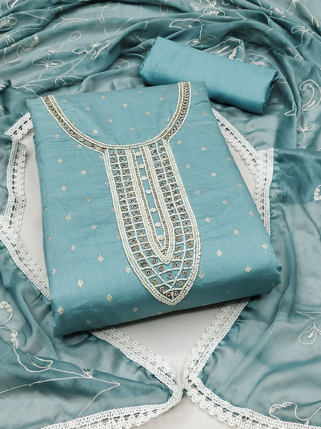 

Ishin Teal Blue Floral Embroidered Beads and Stones Unstitched Dress Material