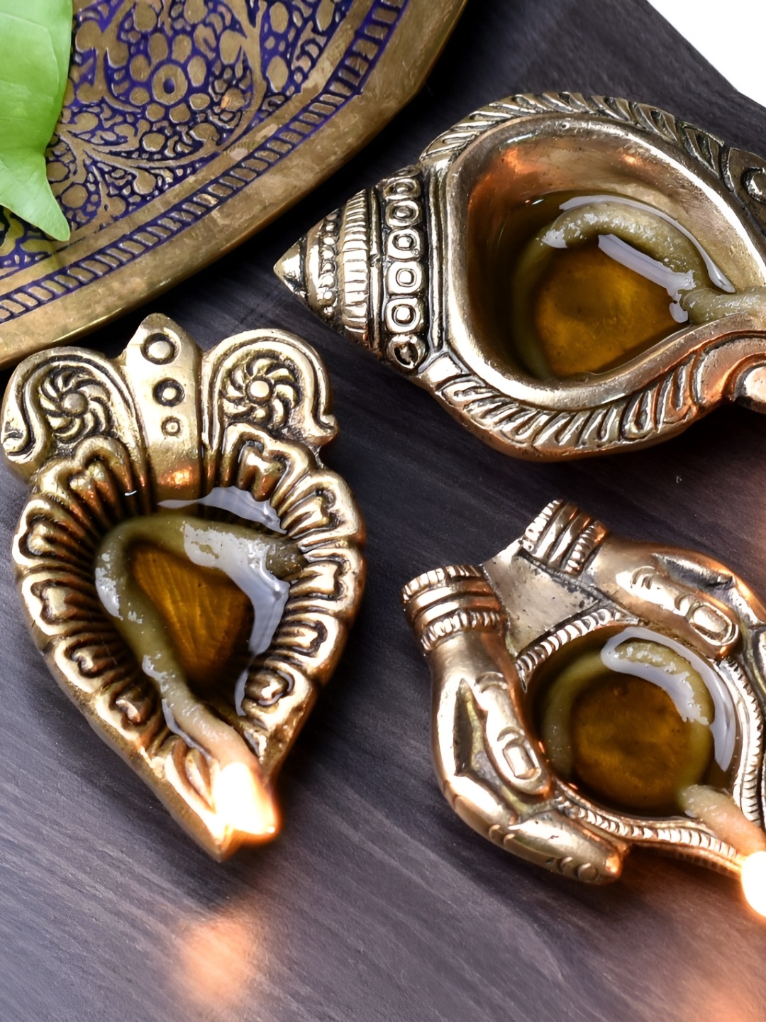 

Indianshelf Gold-Toned 3 Pieces Textured Brass Diya Pooja Essentials