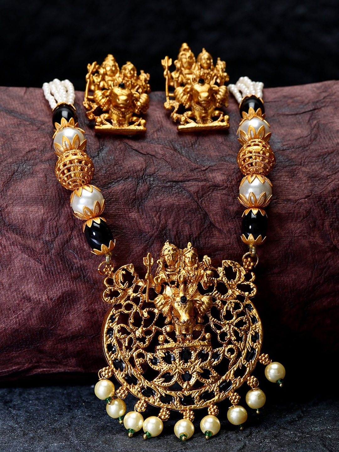 

ANIKAS CREATION Gold-Plated Gauri Shankar Stones-Studded & Beaded Jewellery Set