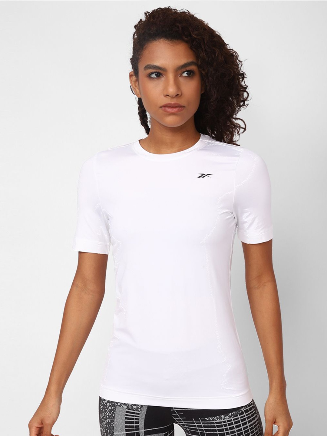 

Reebok Women WOR SW Solid T-Shirt, White