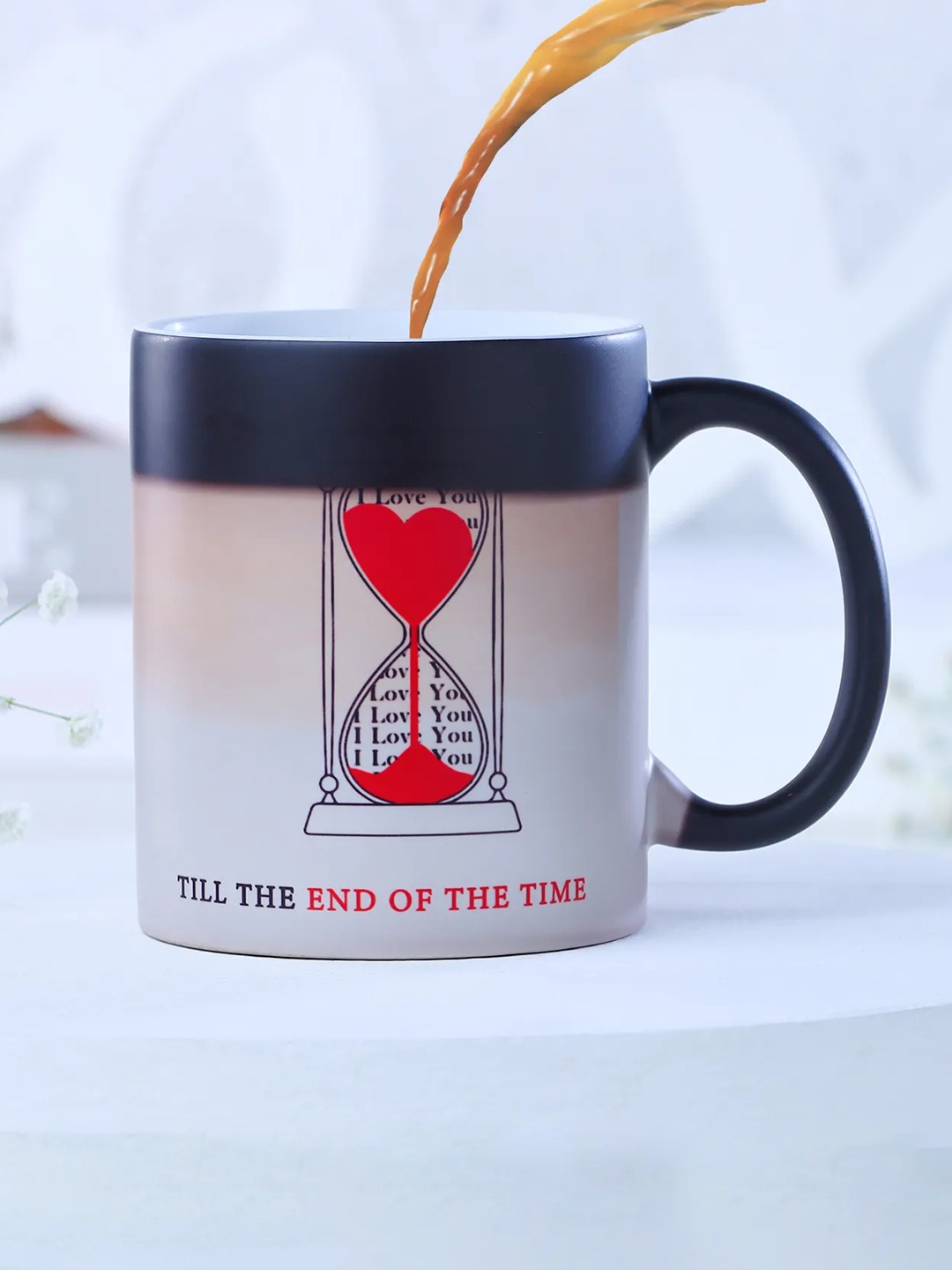 

fnp Black & White Printed Ceramic Glossy Magic Mug 325 ml