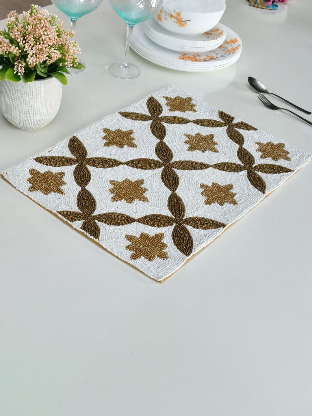 

Athome by Nilkamal Off White & Gold Toned Floral Embellished Beaded Table Placemat