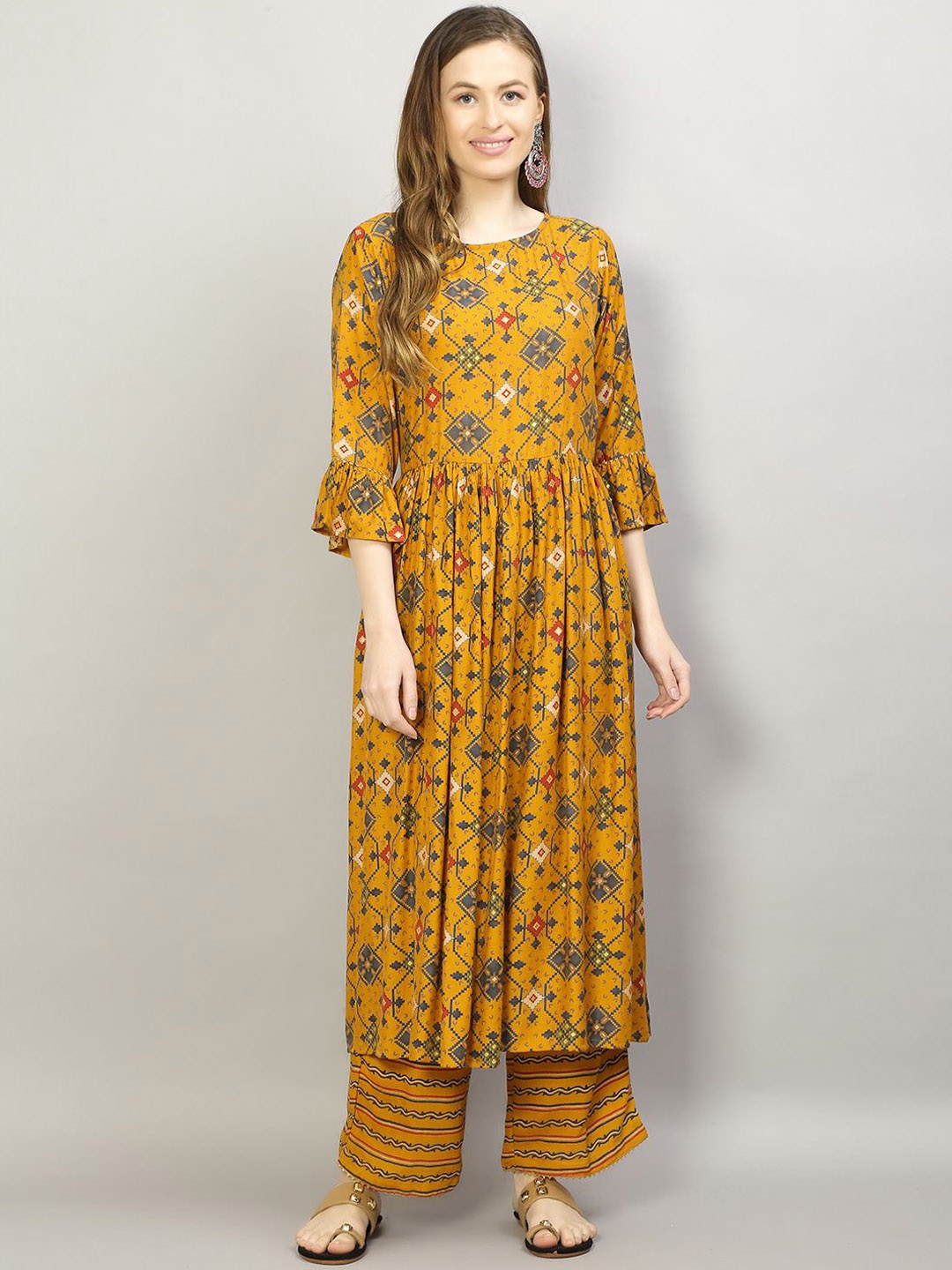 

Shree Geometric Printed Round Neck Pleated Anarkali Kurta With Trousers, Mustard