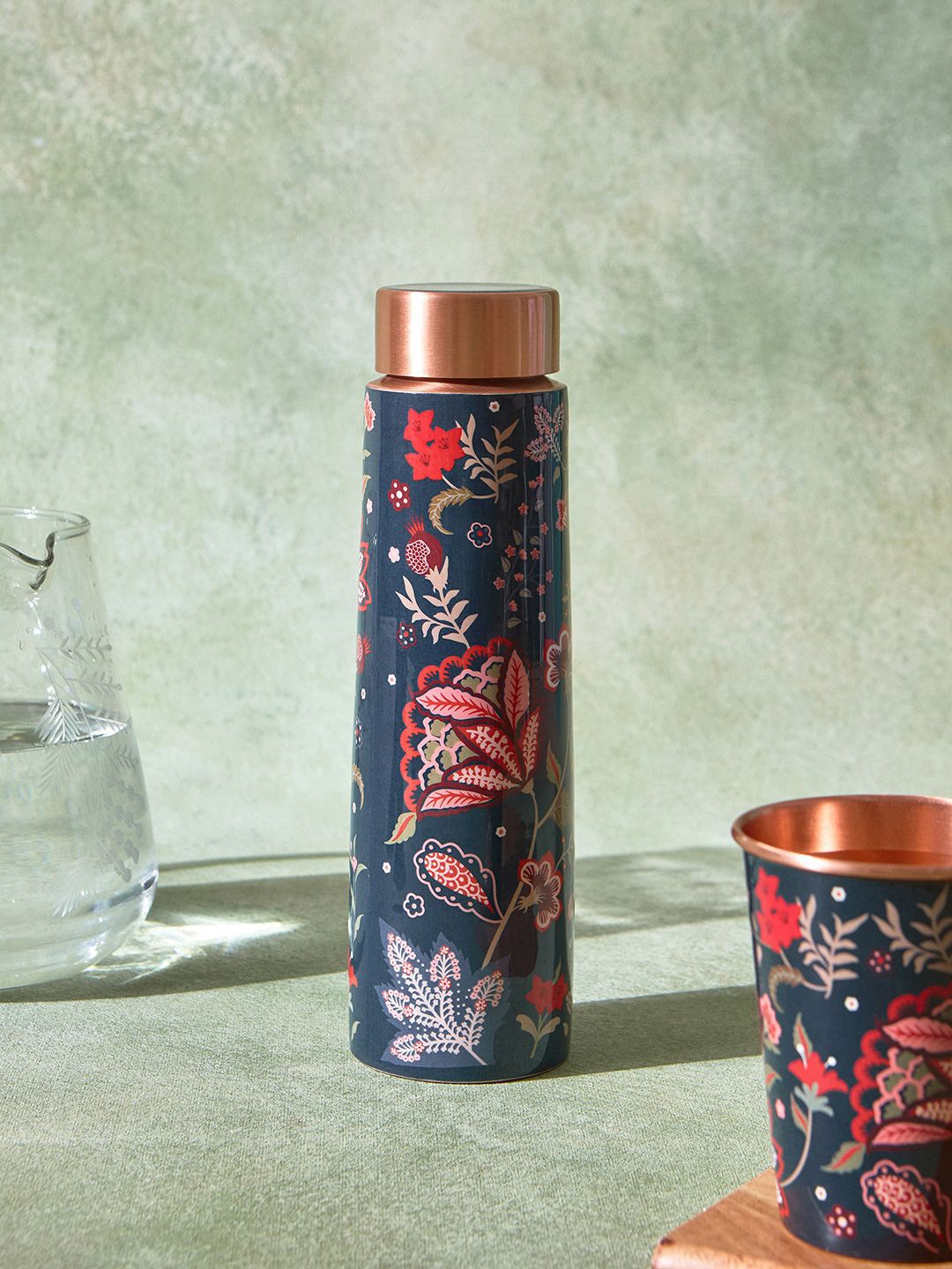 

Chumbak Navy Blue & Red Floral Printed Copper Water Bottle