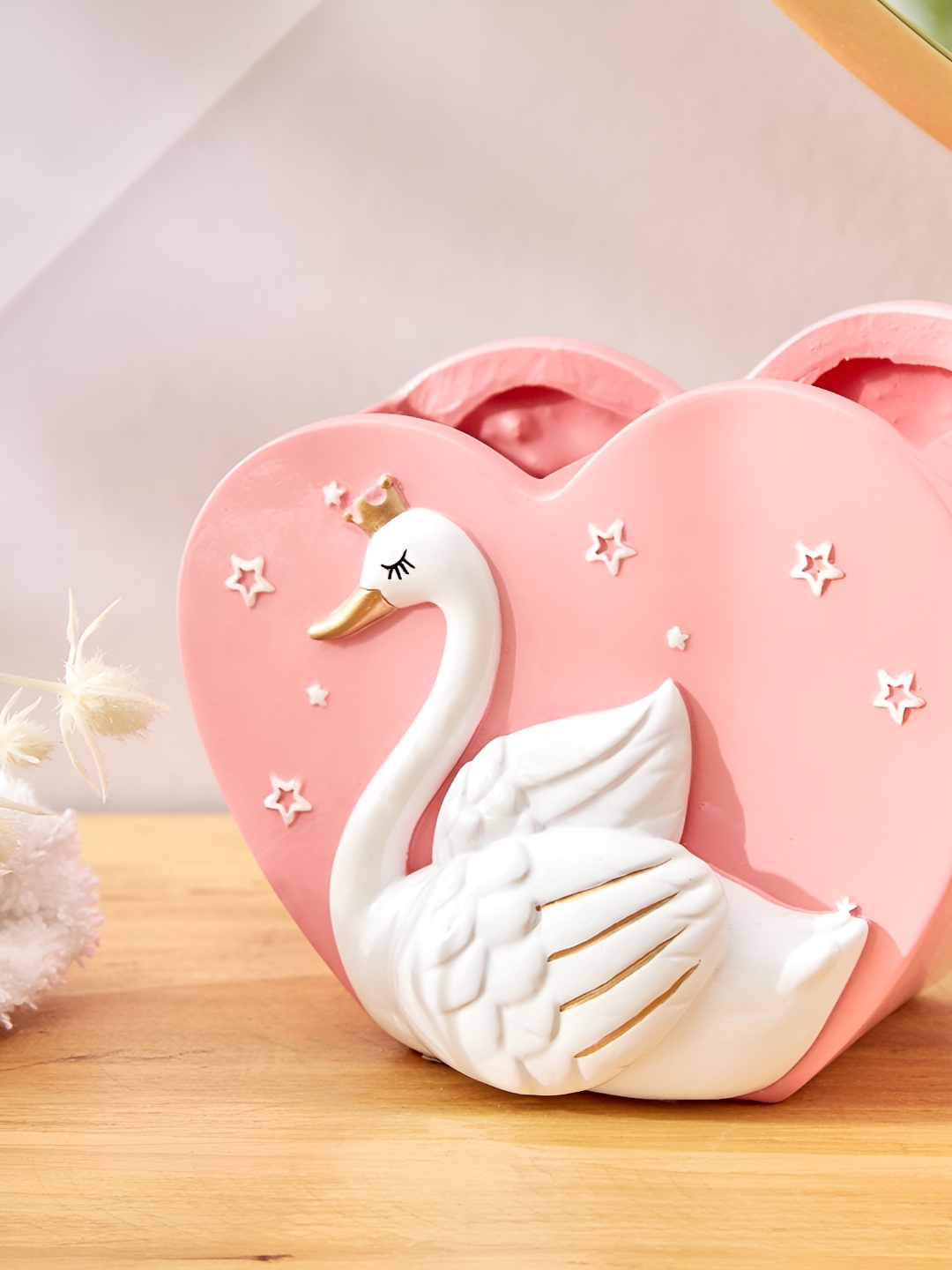 

Home Centre Pink & White Duck Textured Polyresin Toothbrush Holder