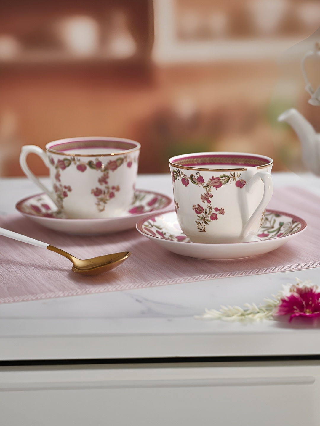 

Troveas Magenta & White 12 Pieces Printed Ceramic Tea Cup and Saucer 160 ML