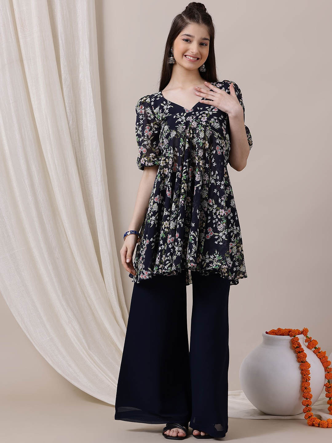 

Inddus Girls Navy Blue Floral Printed V-Neck Empire Georgette A-Line Kurta with Palazzo