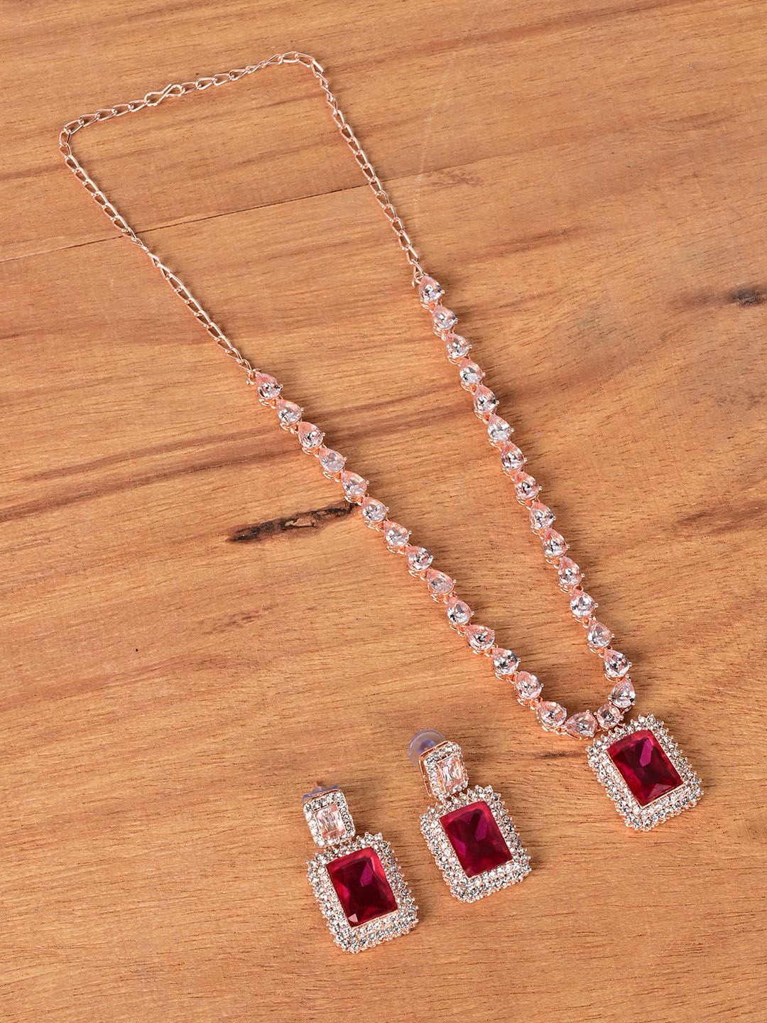 

Keviv Gold-Plated American Diamond Studded Necklace With Earrings