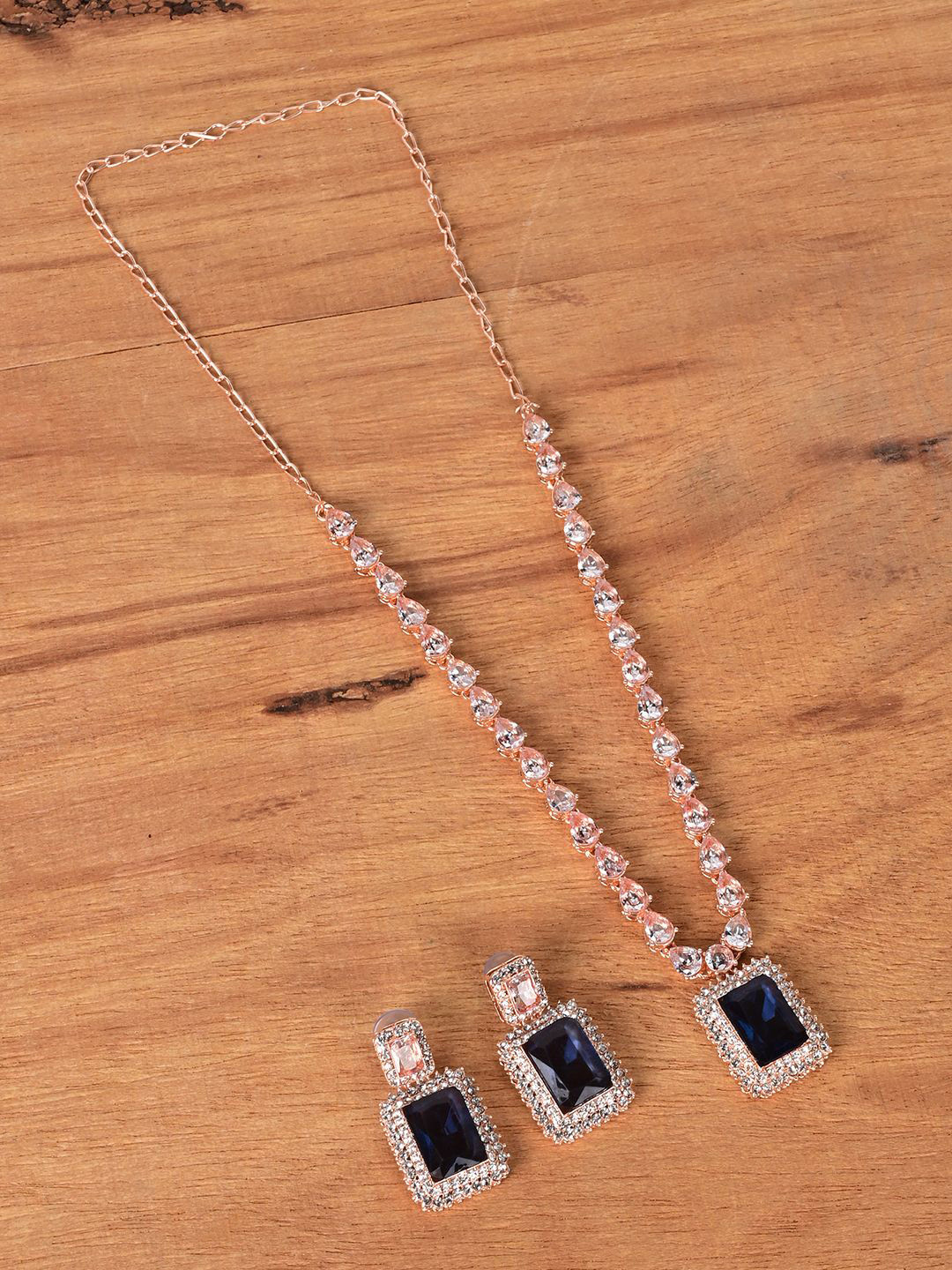 

Keviv Rose Gold Plated American Diamond Studded Necklace With Earrings, Blue