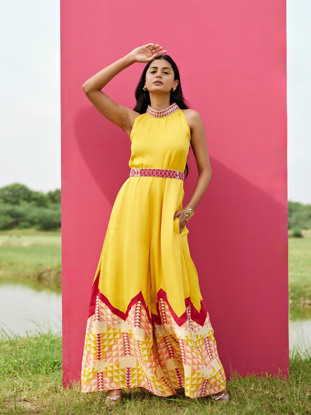 

AMROOD Halter Neck Printed Basic Jumpsuit with Embroidered Belt, Yellow