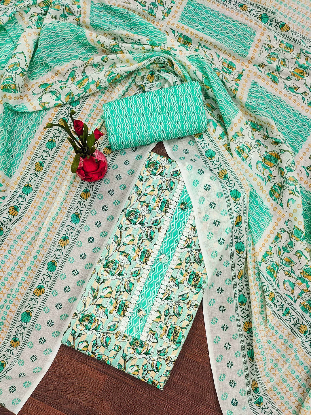 

Ishin Sea Green & White Floral Printed Unstitched Dress Material