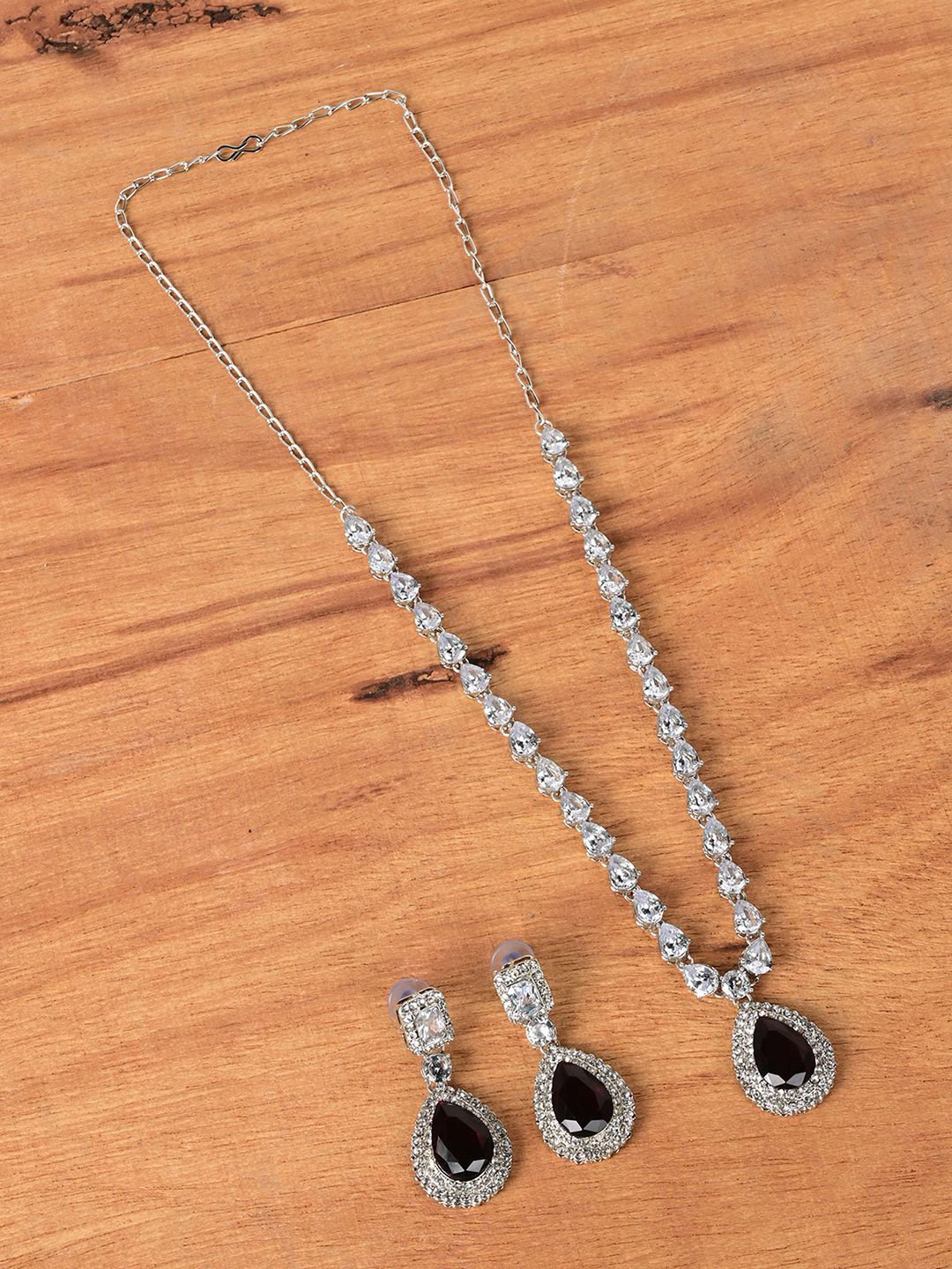

Keviv Gold Plated American Diamond Studded Necklace With Earrings
