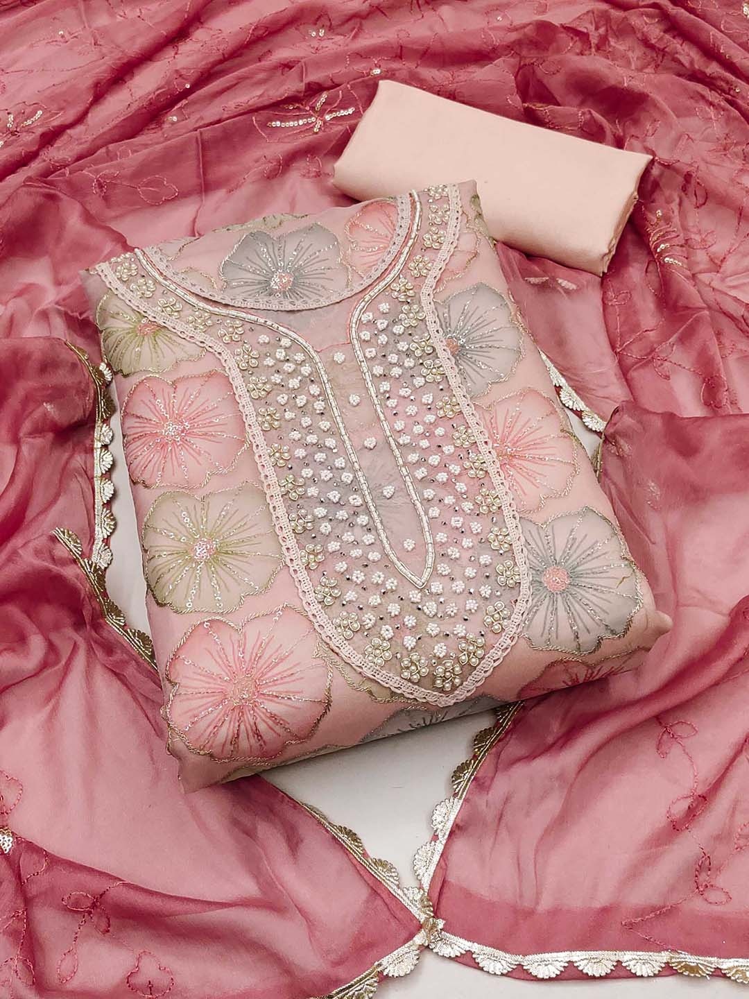 

Ishin Peach-Coloured Ethnic Motifs Embroidered Sequined Organza Unstitched Dress Material
