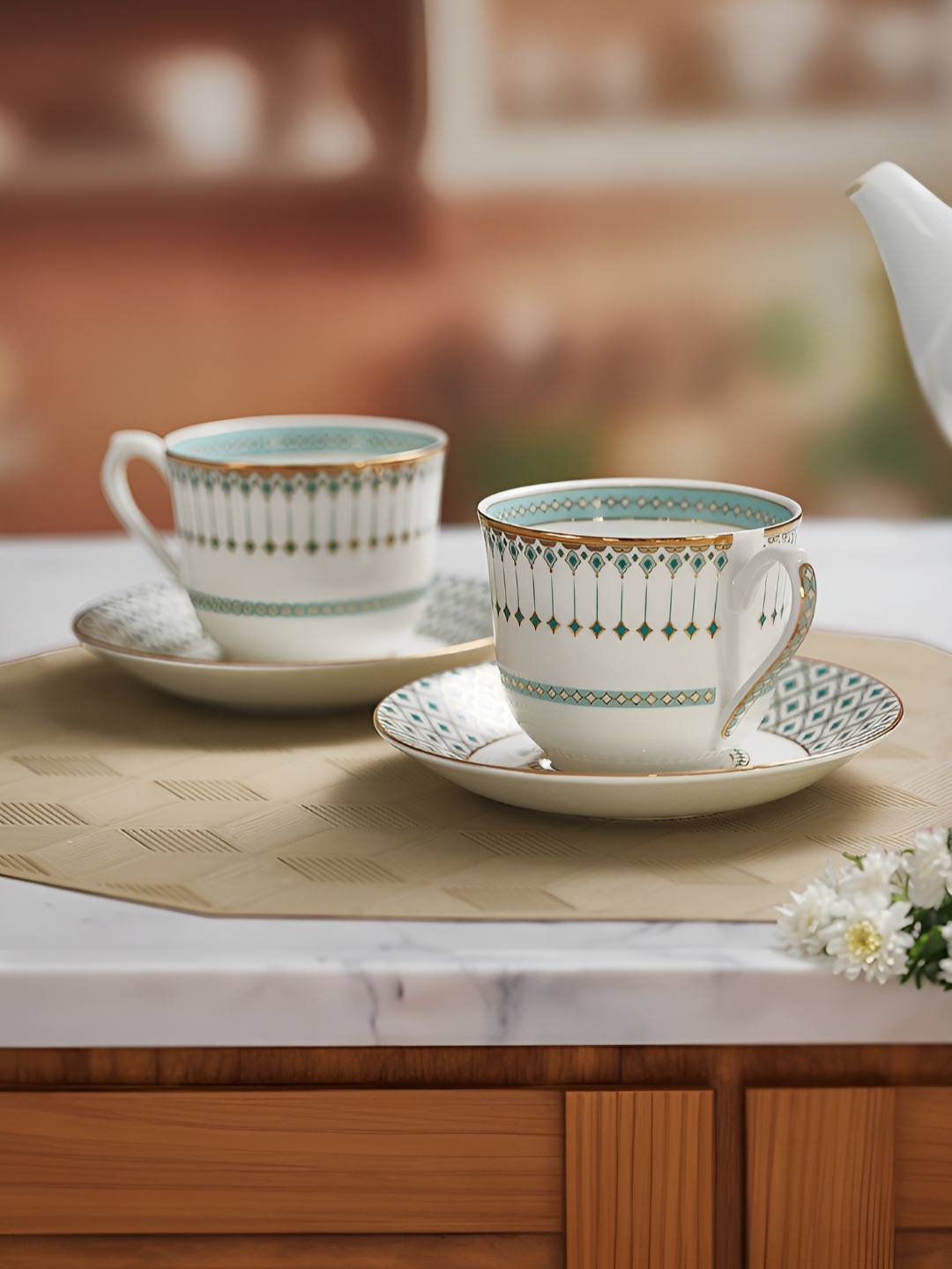 

Troveas Green & White 12 Pieces Printed Ceramic Tea Cup and Saucer 160 ML, Turquoise blue