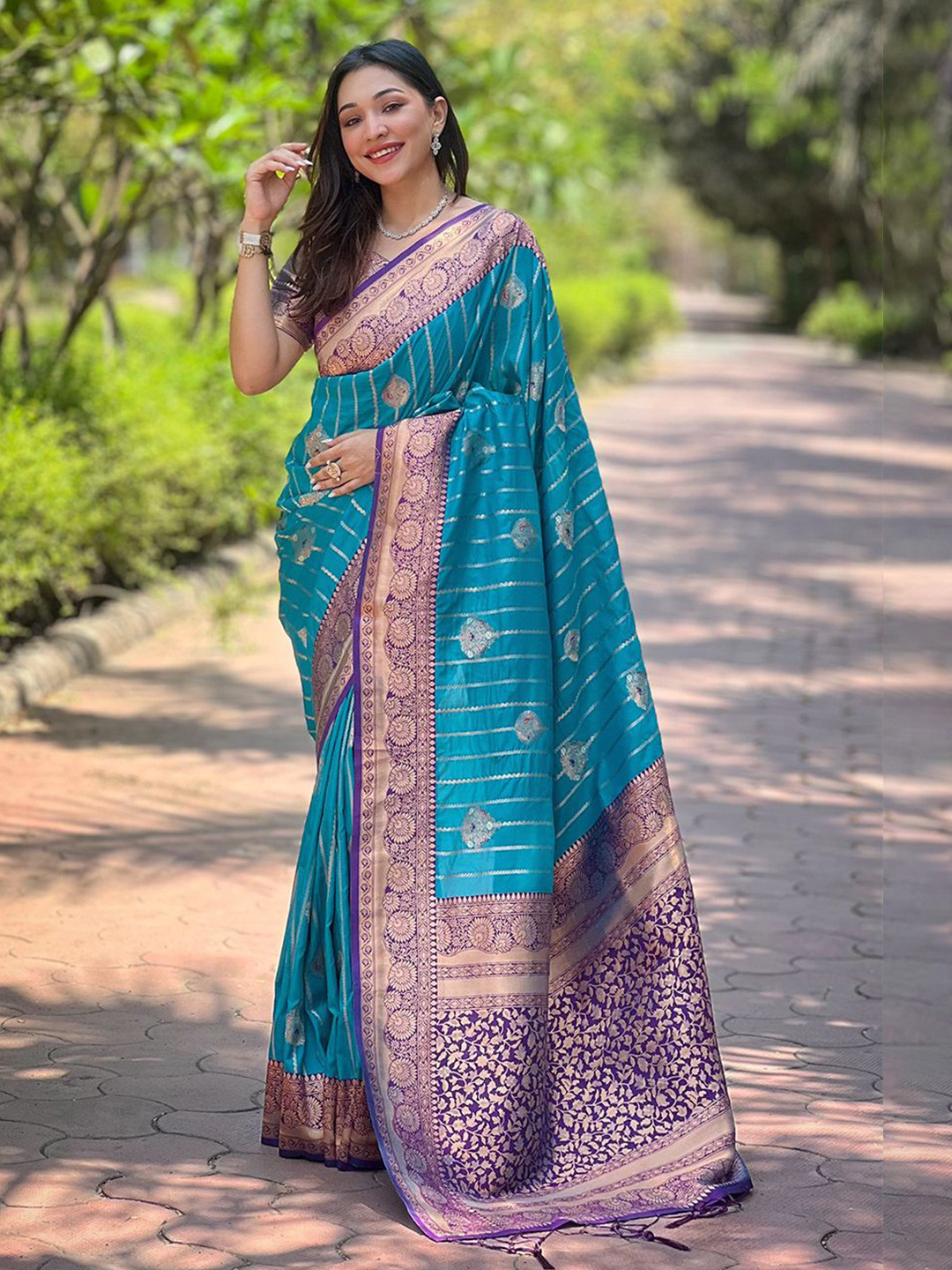 

Mitera Woven Design Zari Silk Blend Banarasi Saree, Teal