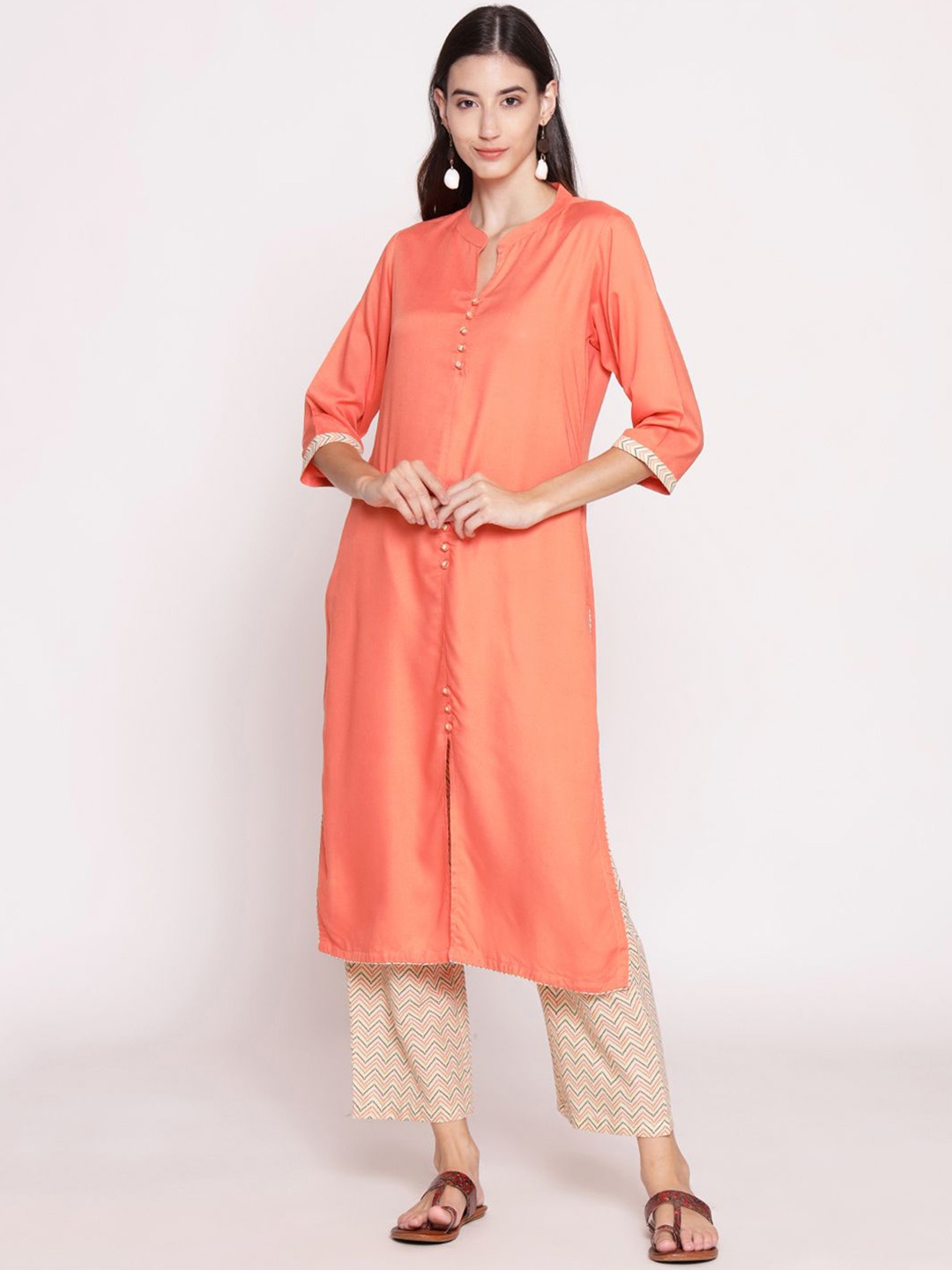 

Shree Mandarin Collar Three-Quarter Sleeves Straight Kurta With Palazzos, Orange